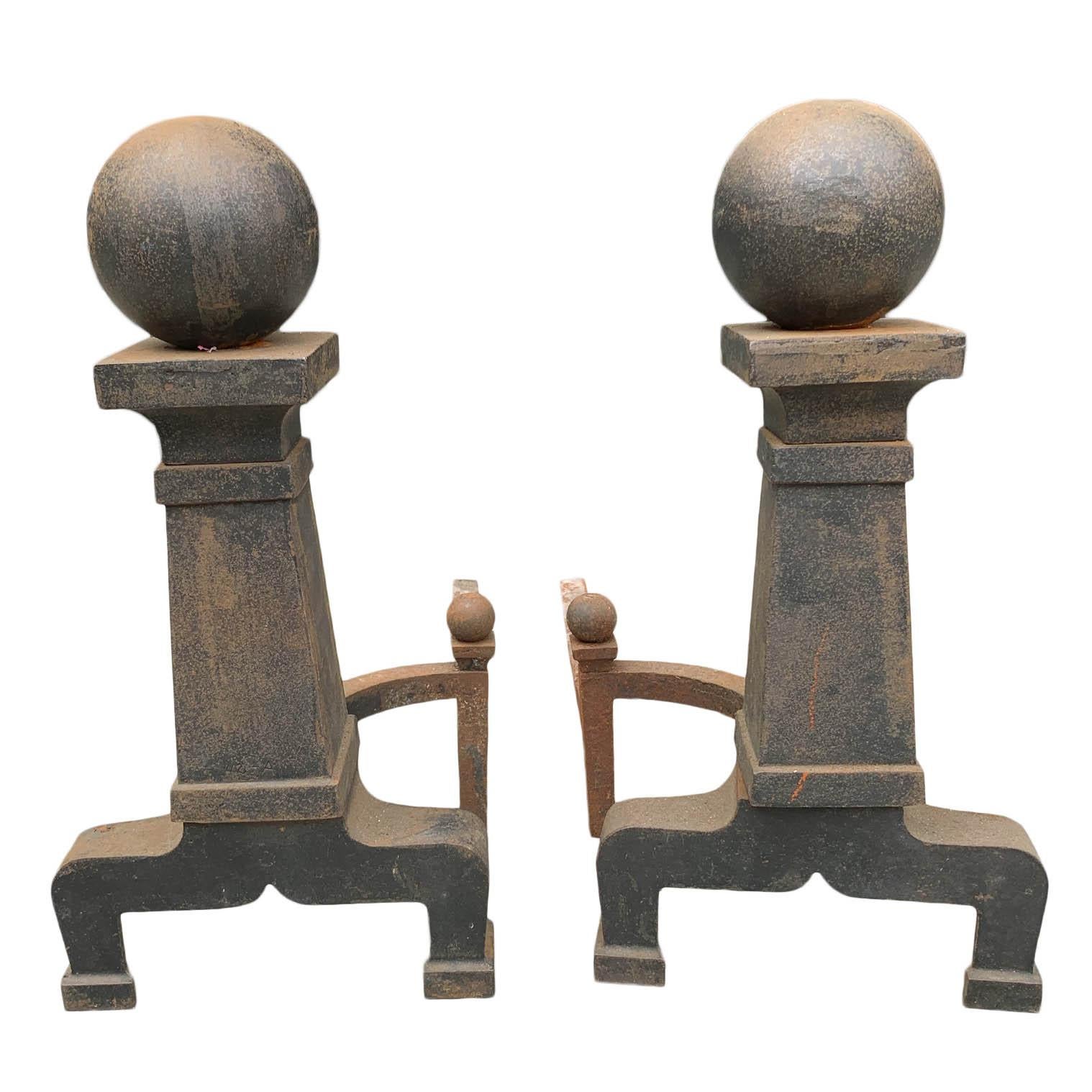 Andirons with welded cannonballs were made in the 19th century. They were big and impressive, measuring 10.5 inches wide, 22.5 inches long, and 20.5 inches tall.
