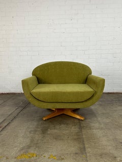 Canoe Swivel Chair by In House Furniture