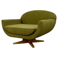 Retro Canoe Swivel Chair by In House Furniture