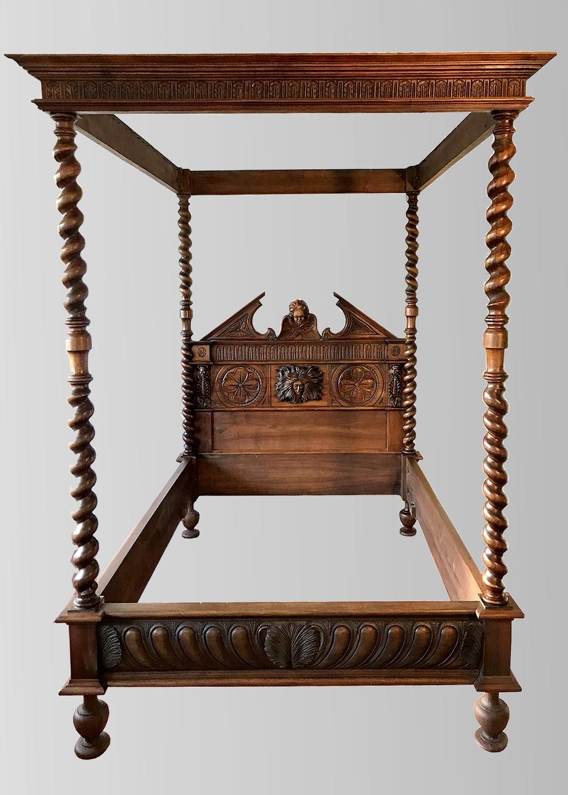 Pretty canopy bed in solid walnut paneled and carved, decorated with marmosets, palmettes and rosettes.
Four twisted Louis XIII style columns support the marquee decorated with palm leaves and surmounted by a cornice.
The crosspieces are decorated