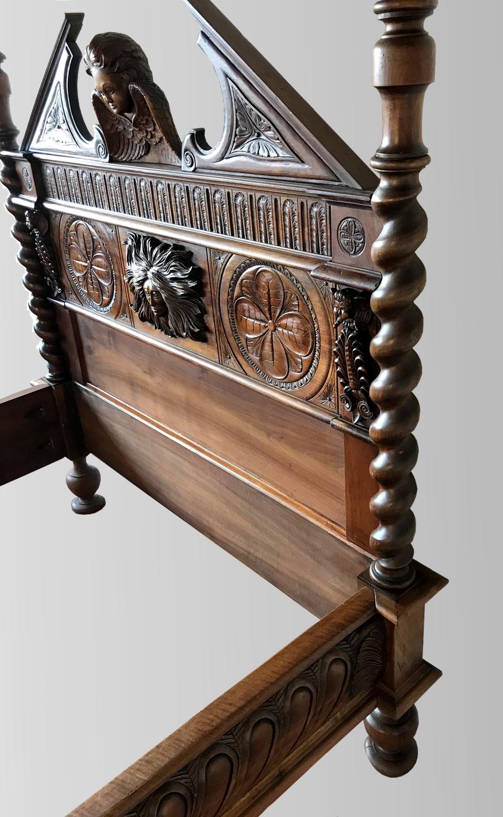 carved canopy bed