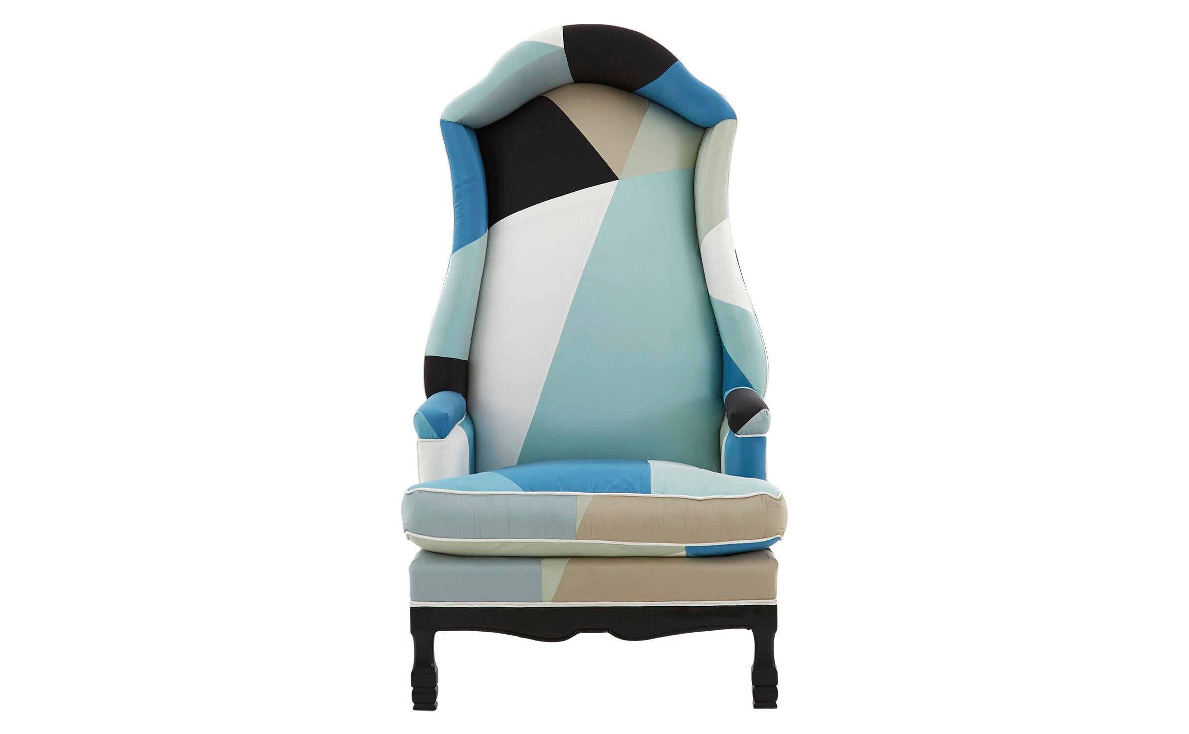 Our vintage Canopy chair was crafted in America in the 20th century. We’ve updated this classic, high-backed frame, reupholstering it in Cubist peacock— a fresh, geometric-patterned silk fabric created by iconic designer Miles Redd for Schumacher &