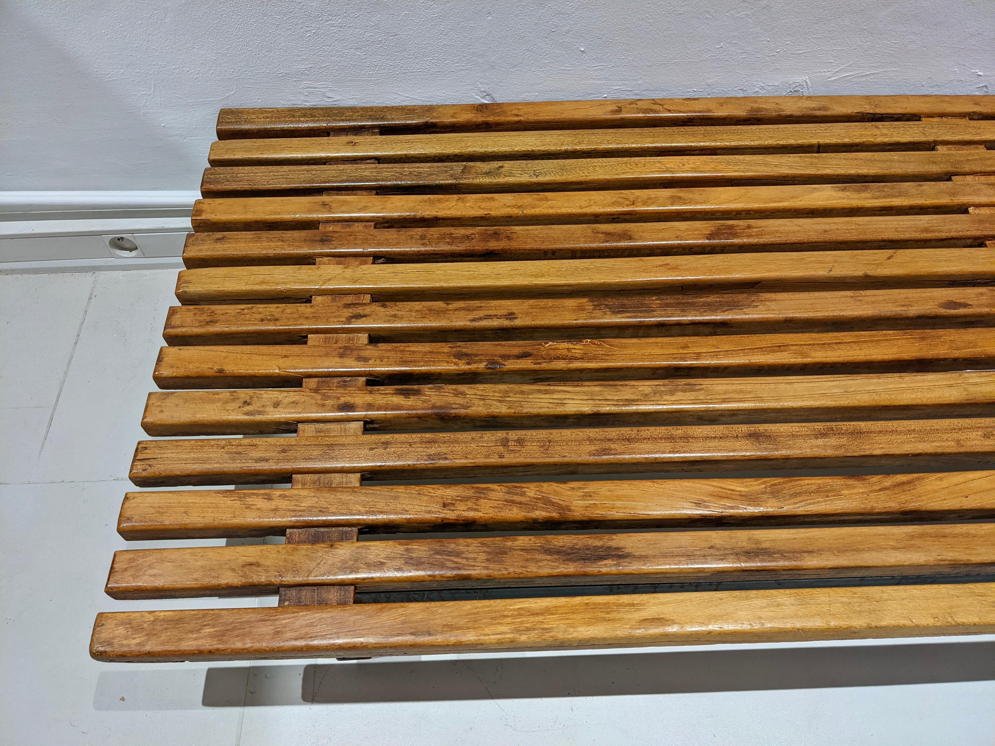 Cansado bench in mahogany tree by Charlotte Perriand. Year 1954. Edition Steph Simon. Very good condition. Provenance: Cansado mining town, Mauritania, Africa.