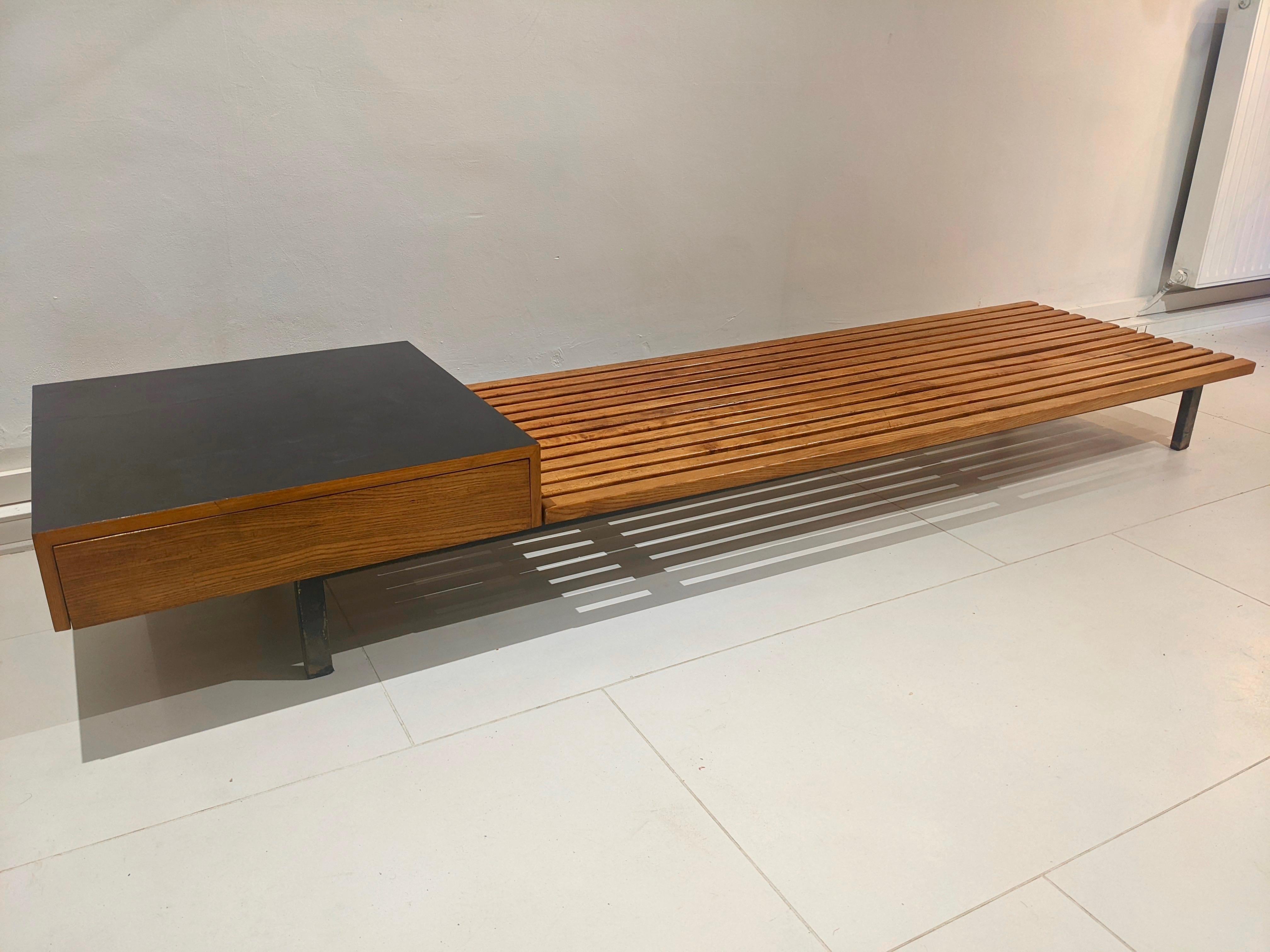 Cansado bench with drawers by Charlotte Perriand. Year 1954. Steph Simon edition. Good condition. 
Provenance : Cansado mining city, Mauritania, Africa.
Some defects are visible on the front of the drawer and on the melamine. (see pictures)
