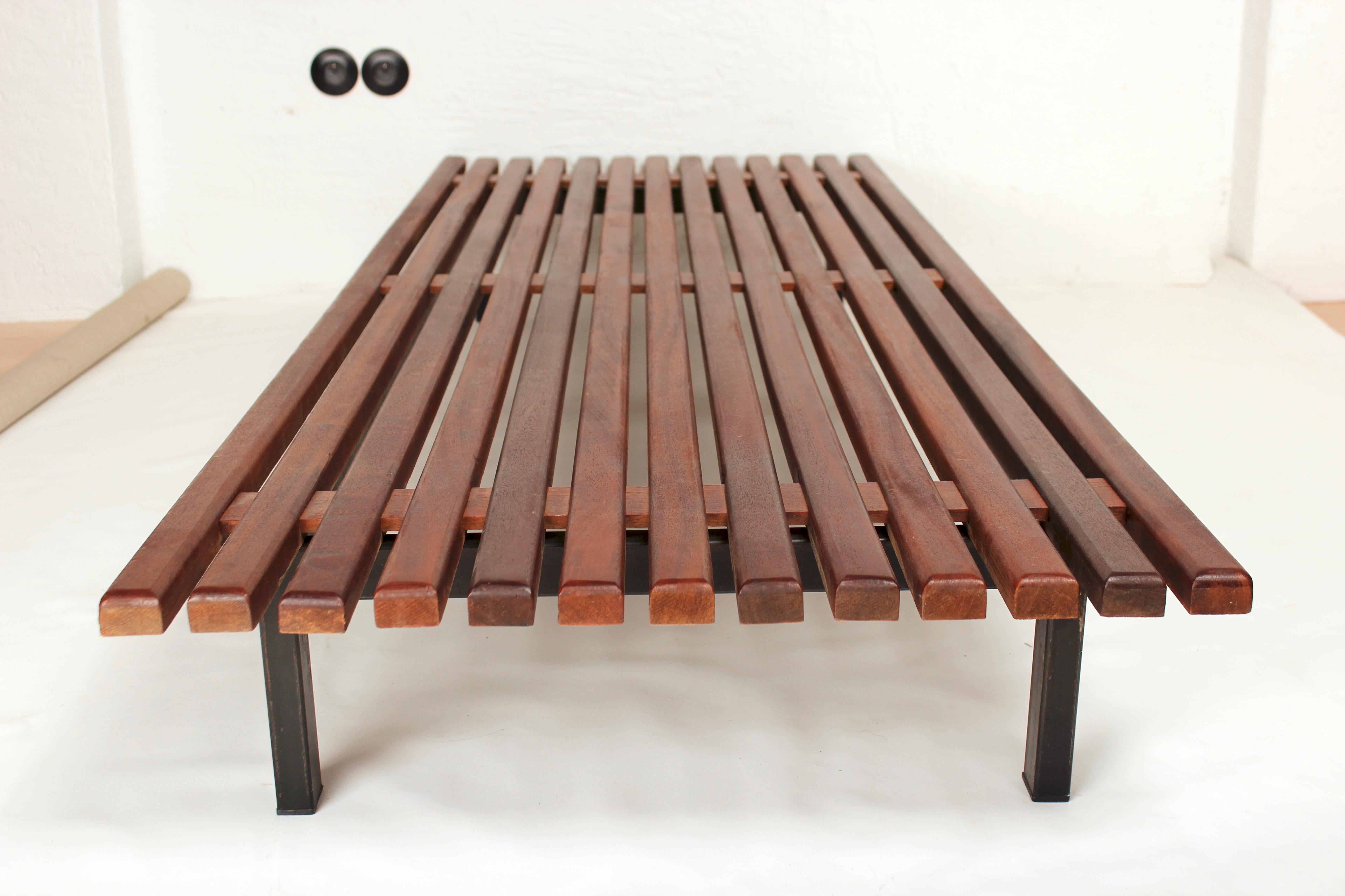 Mahogany bench by Charlotte Perriand from Cansado (Mauritania), circa 1958 for Steph Simon.
This bench can be used as a large coffee table, or a low modernist daybed
Mahogany top has been gently refinished. Metal frame is in great, original