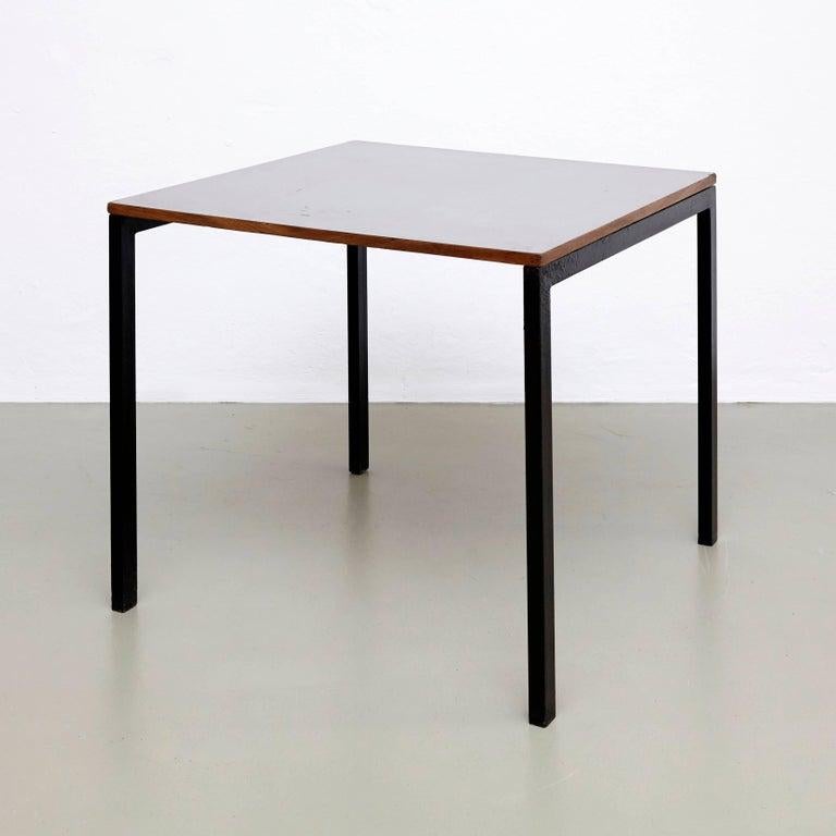 Charlotte Perriand table, designed for la chambres d'étudiant del la Maison du Brésil, Cité Internationale Universitaire de Paris.

Manufactured, circa 1950.

In original condition, with minor wear consistent with age and use, preserving a