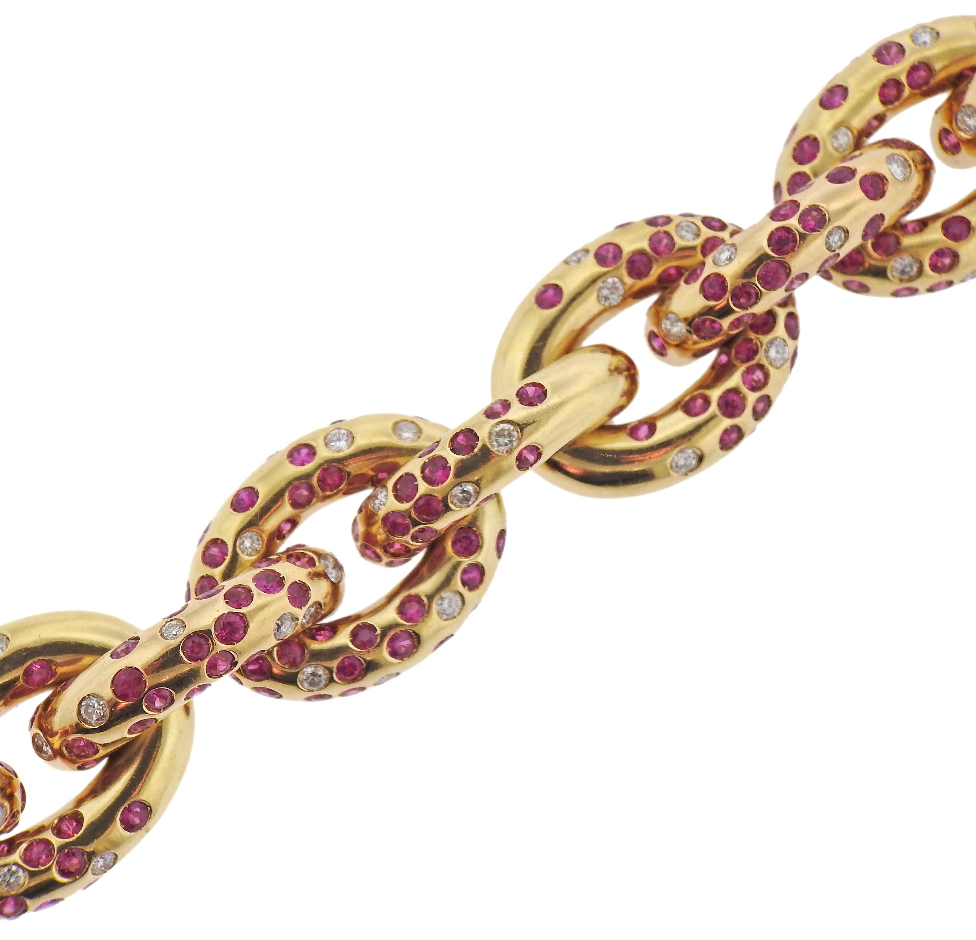 18k yellow gold link bracelet by Cantamessa, with vibrant rubies and approx. 2.00ctw in diamonds. Bracelet is 8