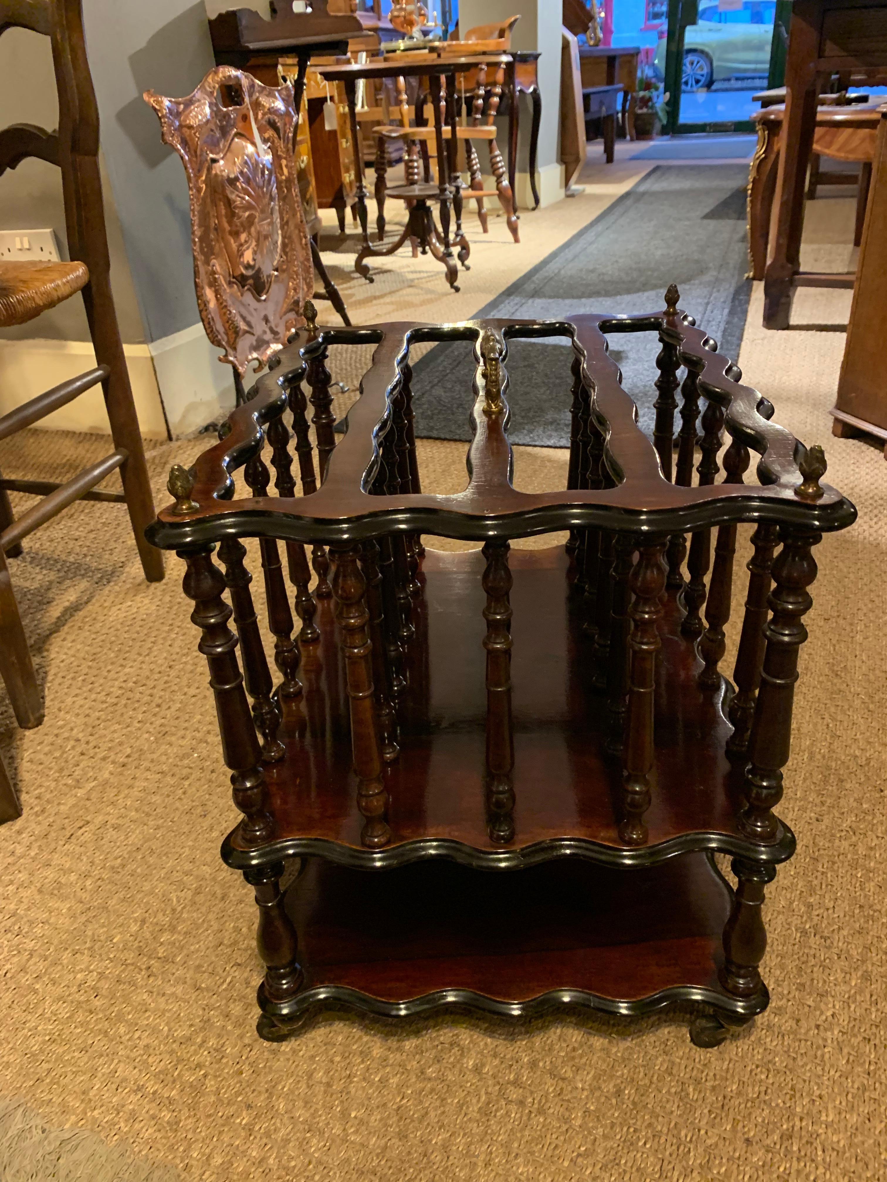 19th century Canterbury, original ormolu mounts and castors 

Great magazine rack, dating to circa 1870s , having been through our workshops and been cleaned and polished


Measures: Height 18 inches
Width 17 inches 
Depth 14.5 inches.