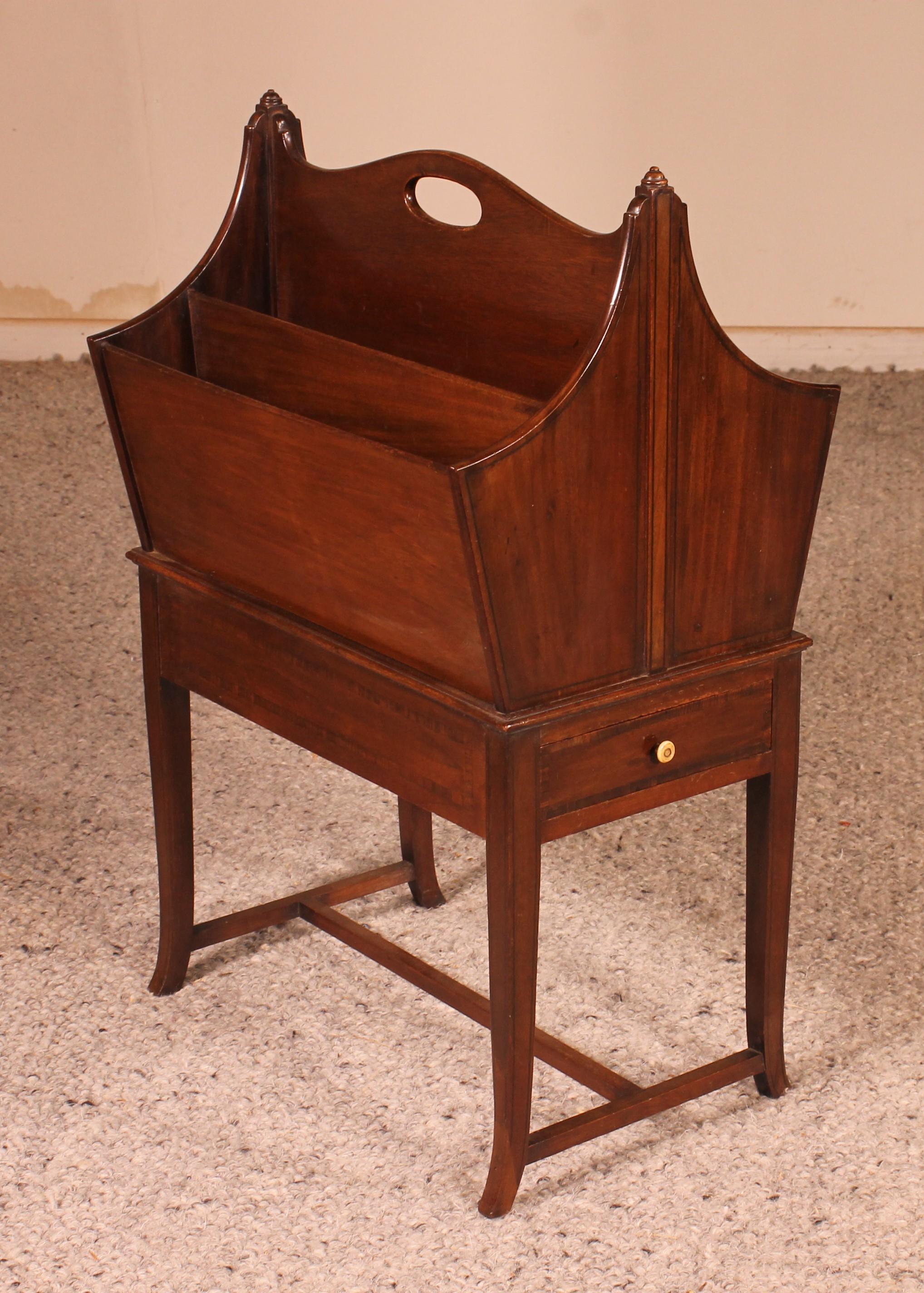 lovely English mahogany canterburry from the early 20th century, Edwardian period

Small practical piece which has a drawer and which serves as a newspaper/magazine rack
The canterbury divers from the usual canterbury by its shape. It is narrower