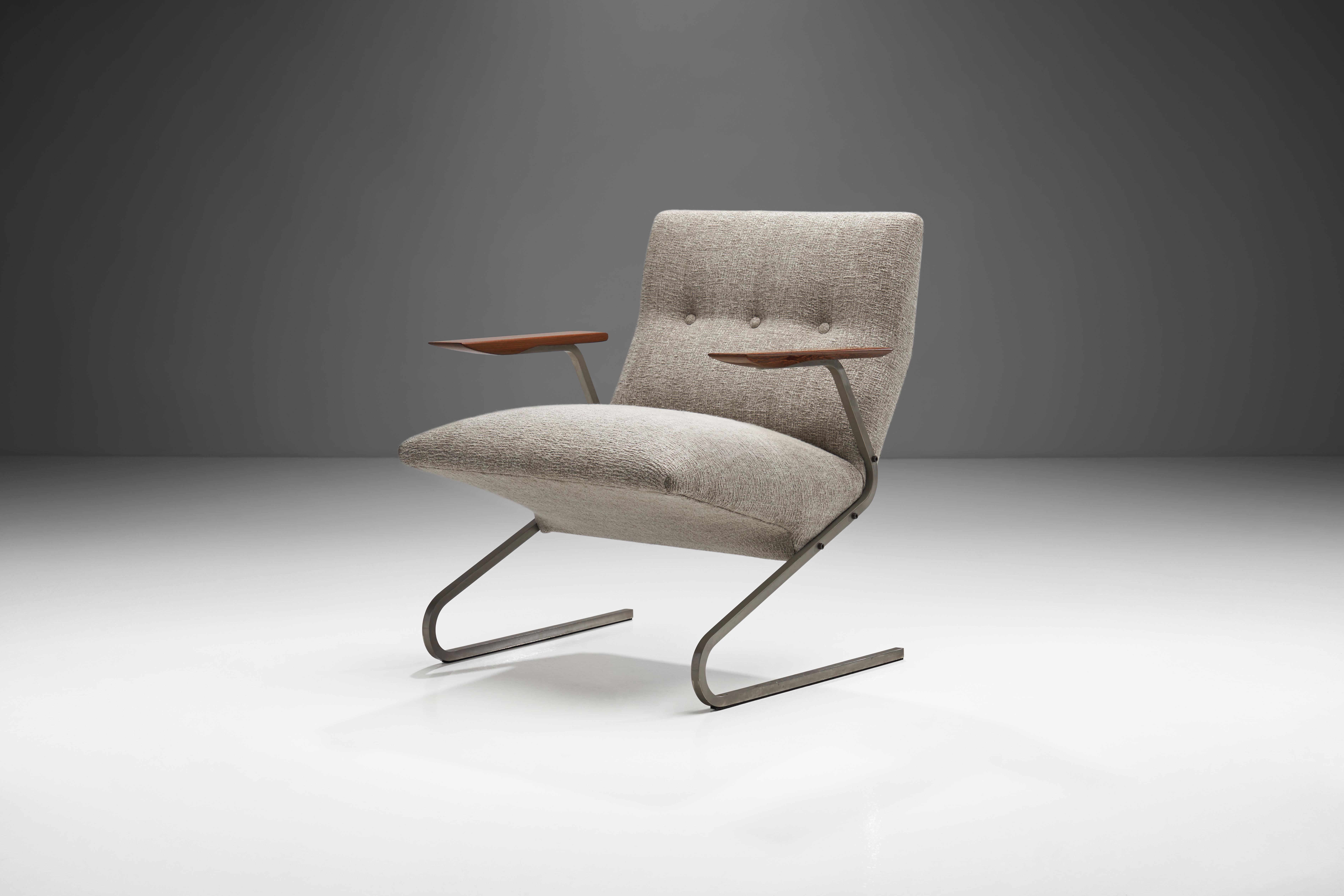 This eye-catching mid-century armchair is the design of the Belgian designer, George van Rijck (also spelled as Georges Van Vanrijk).

The main design element of this playful chair is the tubular, bent metal frame that comprises the body. There is