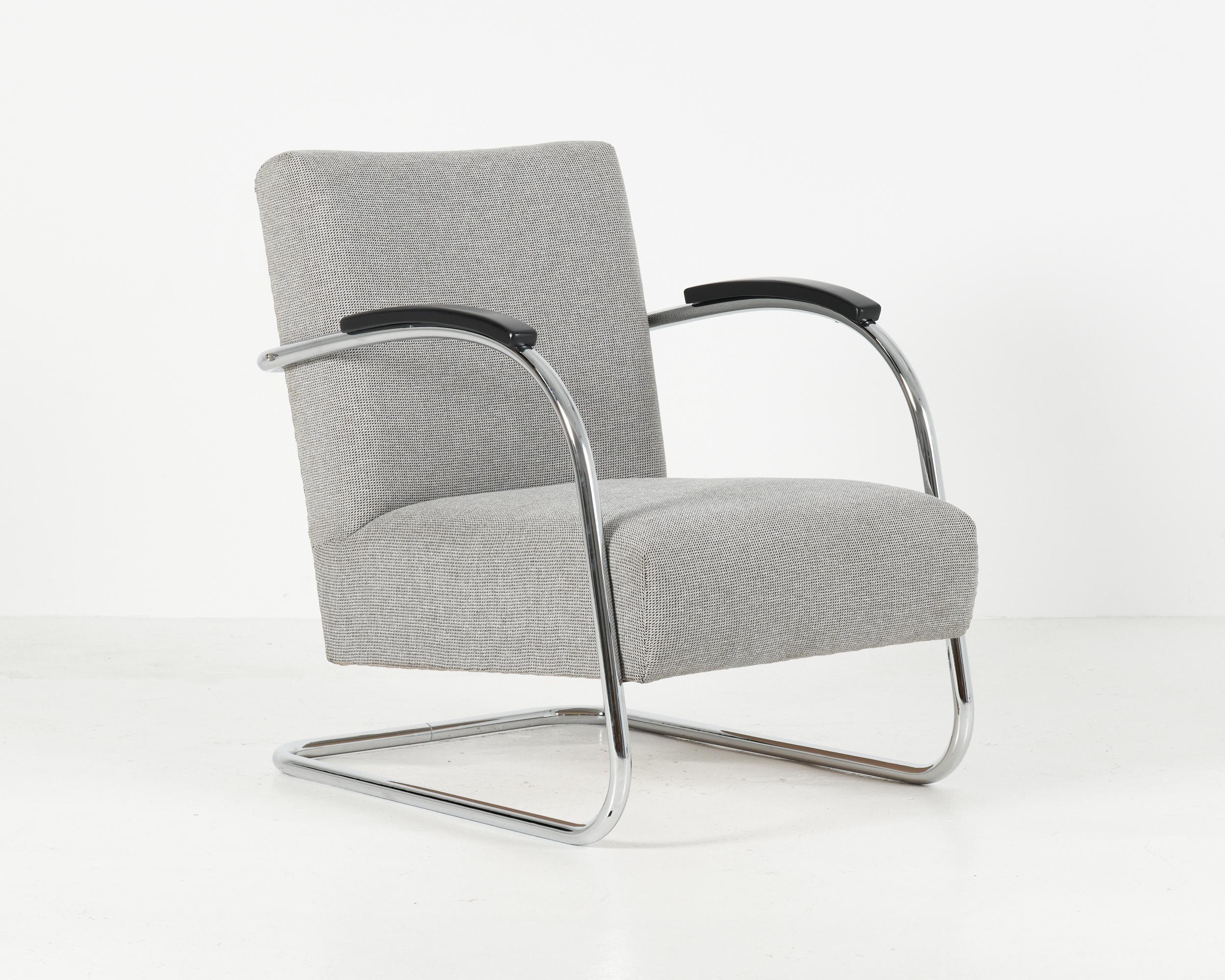 A striking  bauhaus armchair produced by Mücke & Melder, who have set their production processes on the terrain of former Czechoslovakia during the 1930’s.

The chairs have been professionally restored with new seat cushioning and high quality