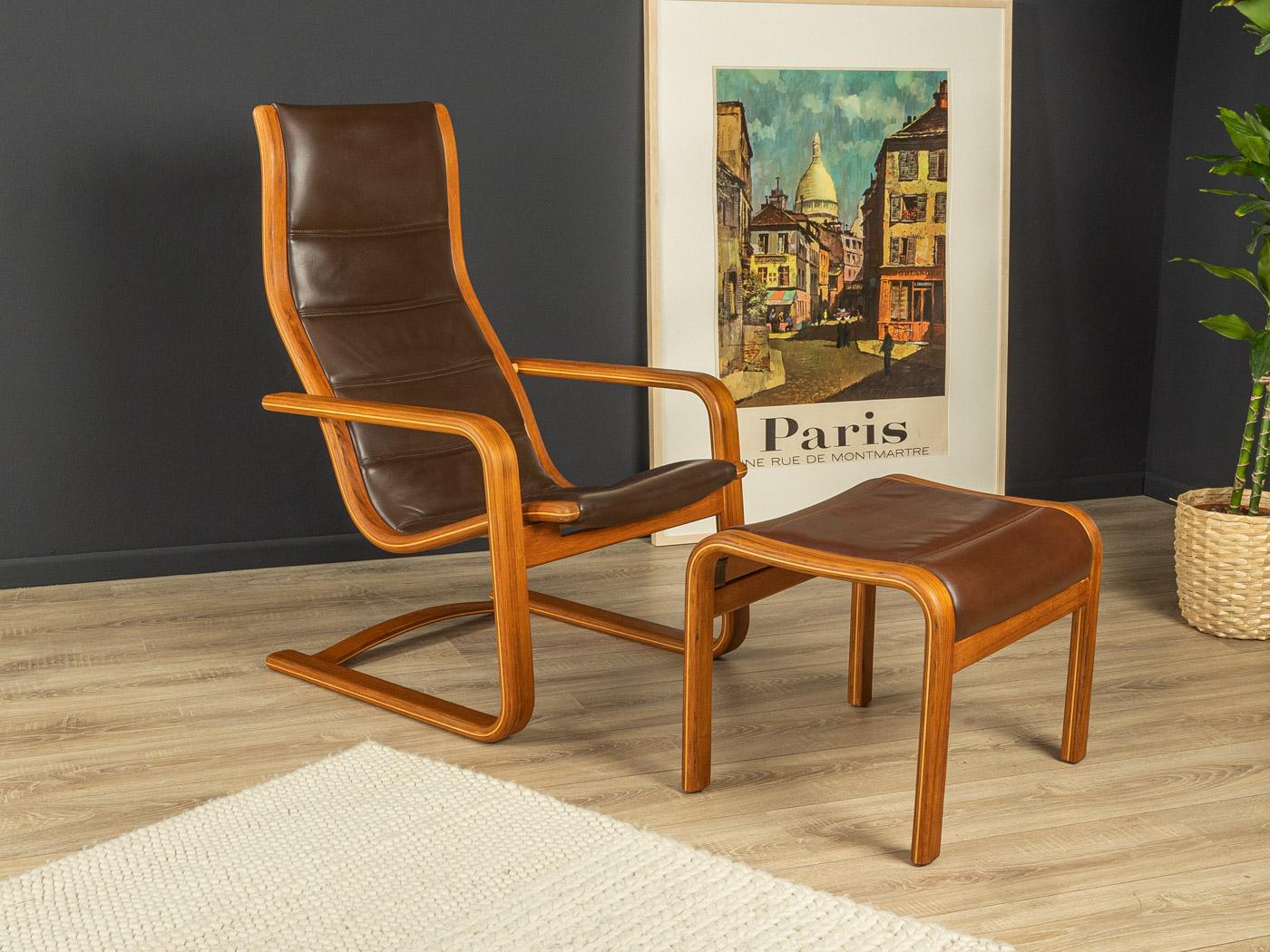 Rare cantilever chair with stool from the 1960s. “Lamello” model by Yngve Ekström for Swedese. Wonderfully curved frame made of solid teak with the high-quality original leather cover in brown.

Quality Features:
- Accomplished design: perfect