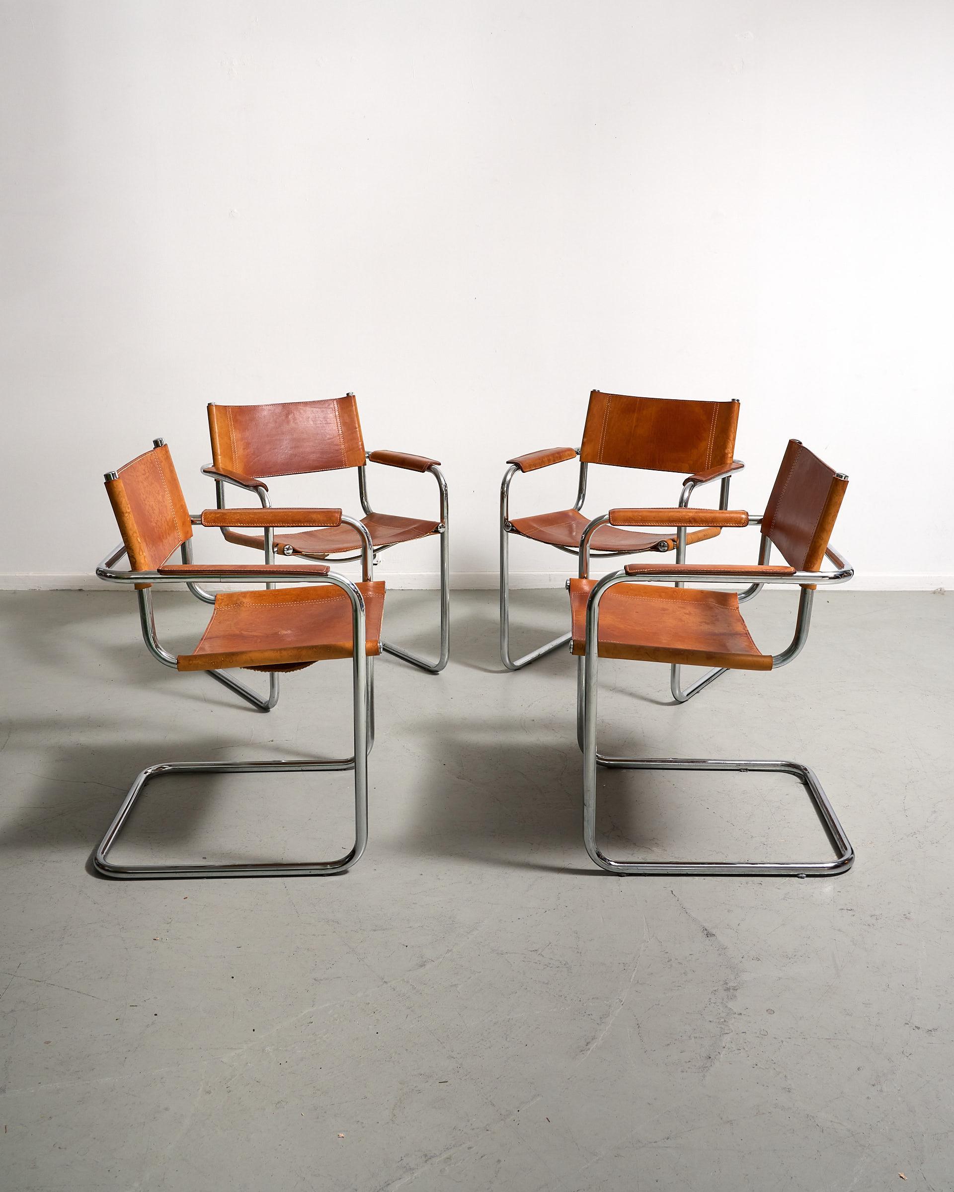 Iconic cantilever chairs by Matteo Grassi with amazing natural cognac patina.
