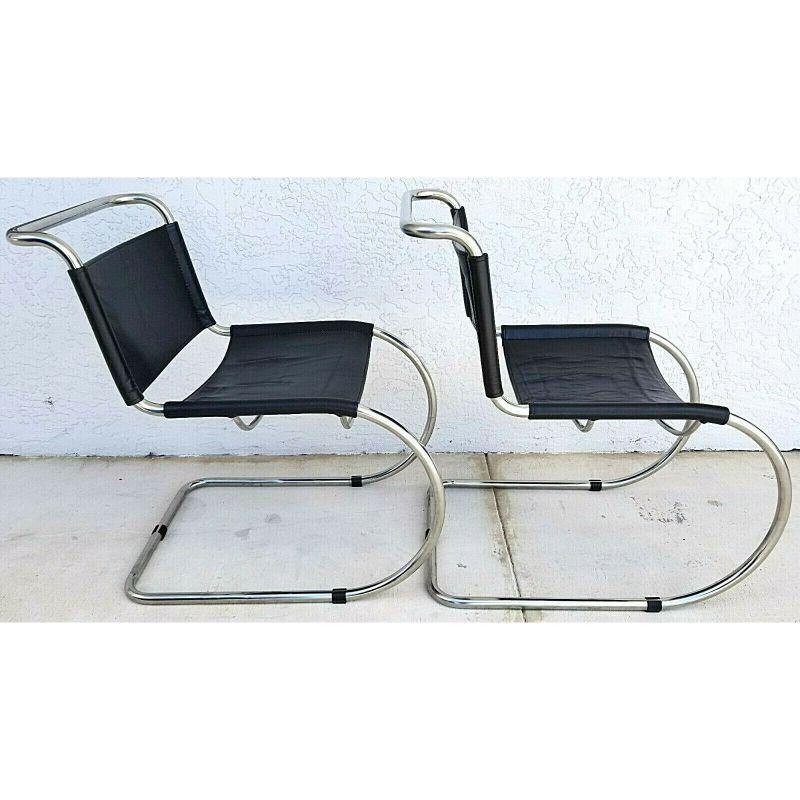 For FULL item description click on CONTINUE READING at the bottom of this page.

Offering One Of Our Recent Palm Beach Estate Fine Furniture Acquisitions Of A 
Pair of Mid-Century Modern Mies van der Rohe Style Cantilever Chrome Leather