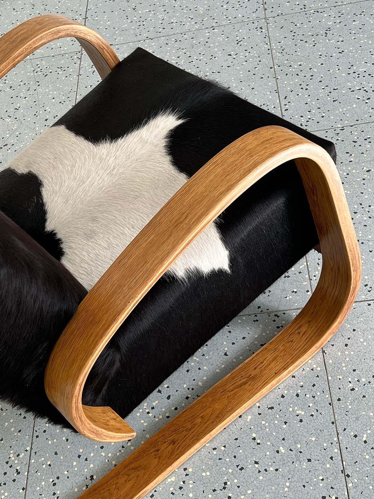 Mid-20th Century Cantilever Lounge Chair by Miroslav Navrátil in Cowhide, 1950s For Sale