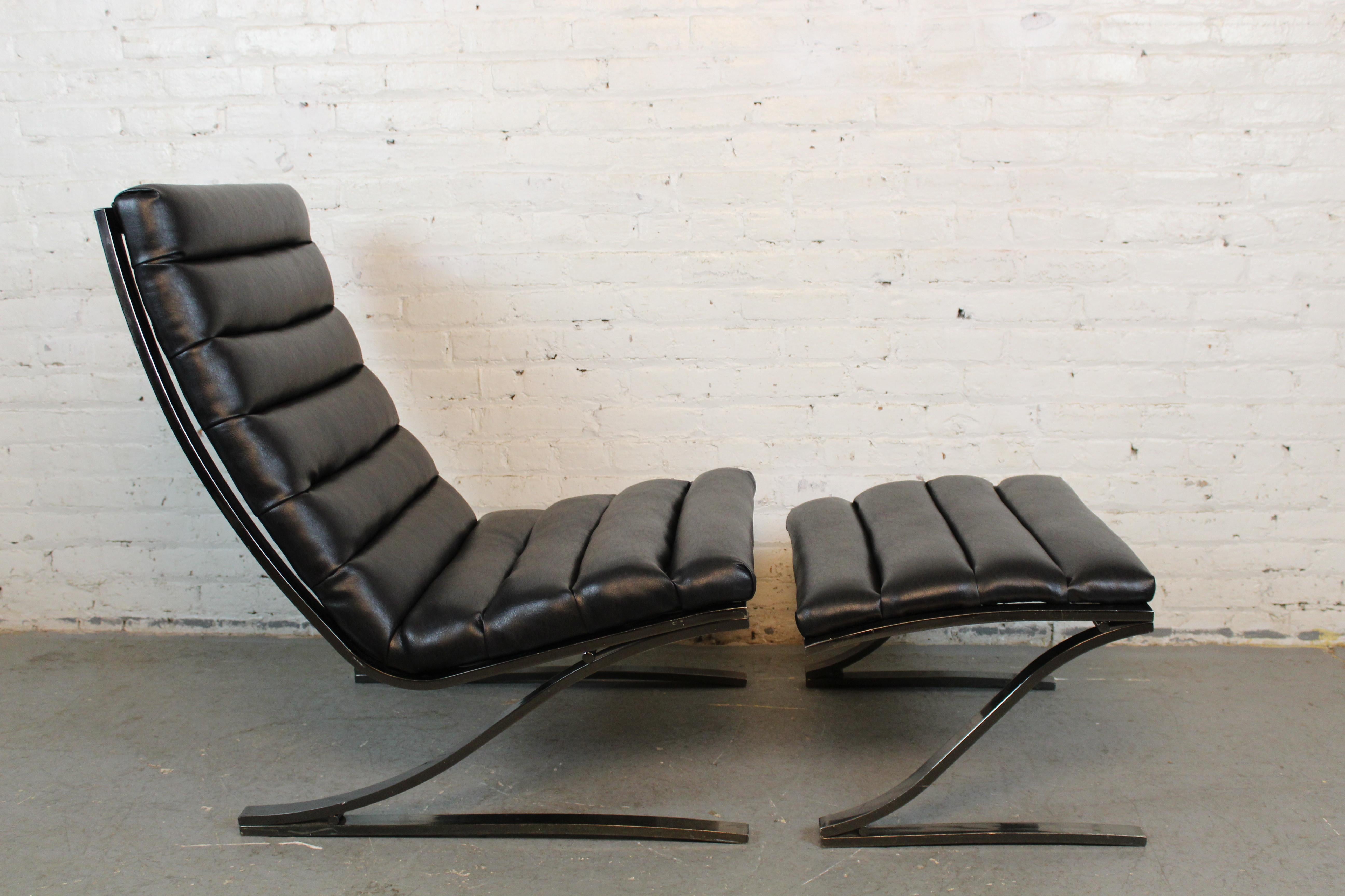 Bring home the fabulous stylings of post-modern furniture with this fantastic cantilevered scoop lounge and ottoman by Design Institute America, or DIA, circa 1986. Newly reupholstered in a luxurious black vegan leather and featuring a clean base