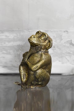 Cantilevered brass ice bucket monkey. Edizioni molto