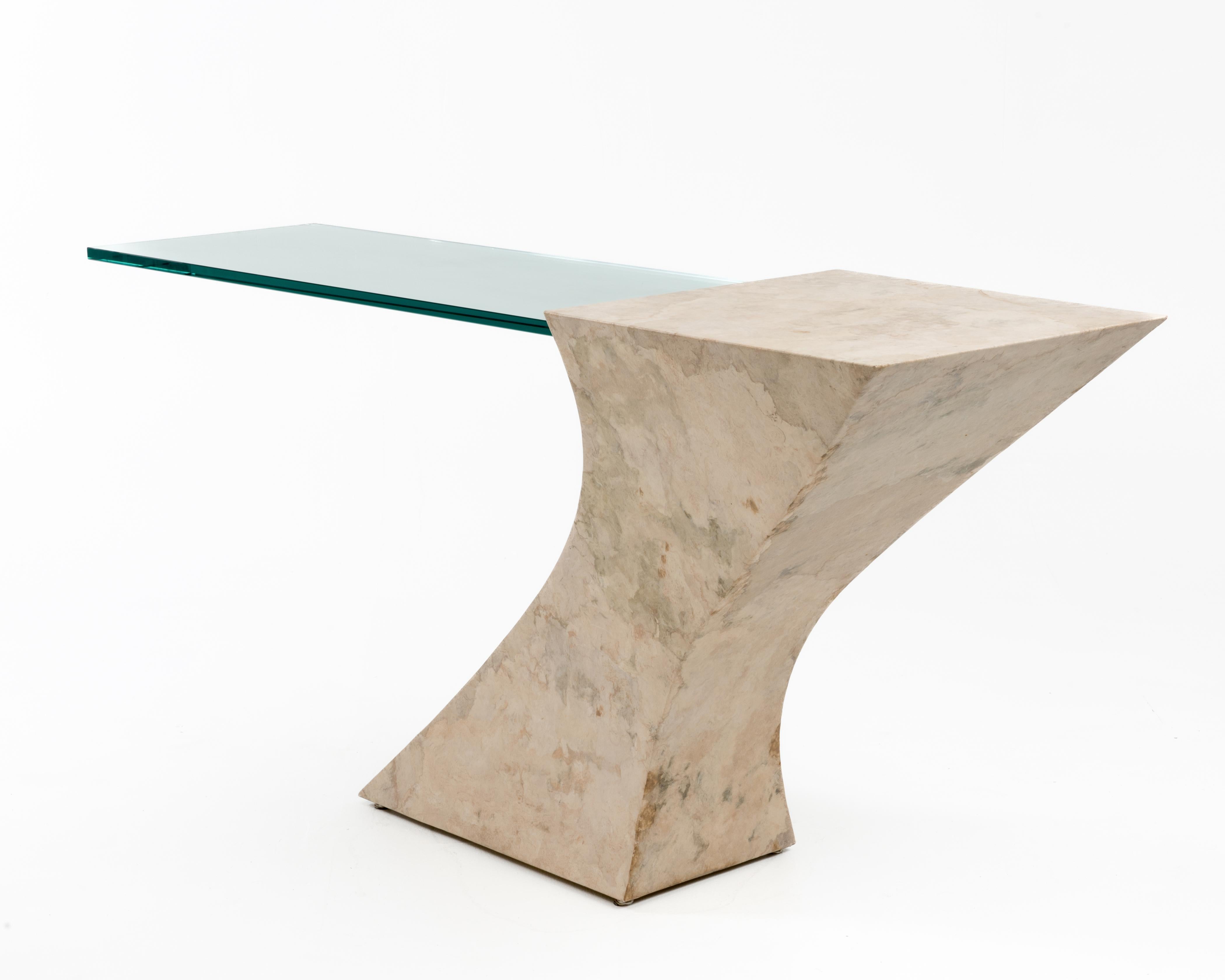 A cantilevered faux goatskin and glass console table in the style of Karl Springer and Brueton. The glass section of the table is H 29.5” W 41.75 x D16” and is .75” thick.