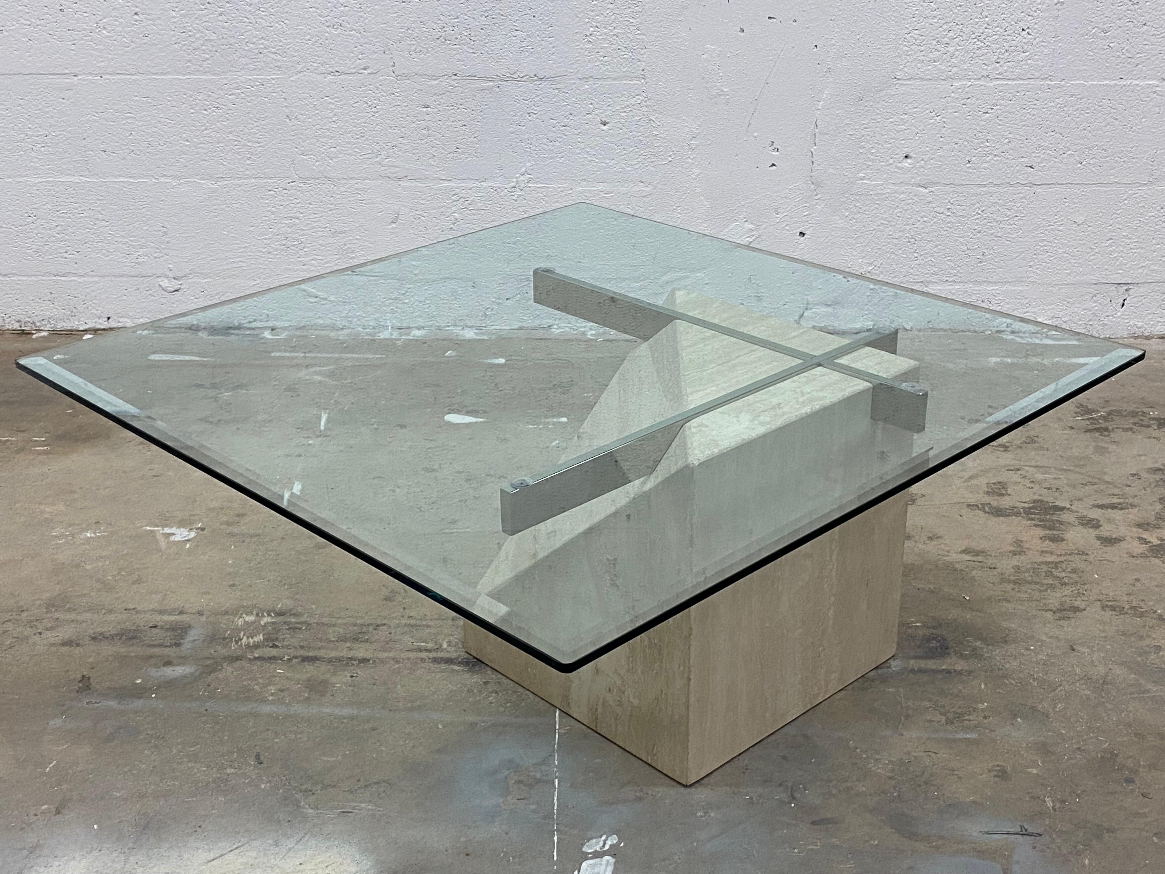Travertine base with cantilevered square beveled glass top supported by chrome bars coffee or cocktail table manufactured by Artedi, 1980s.