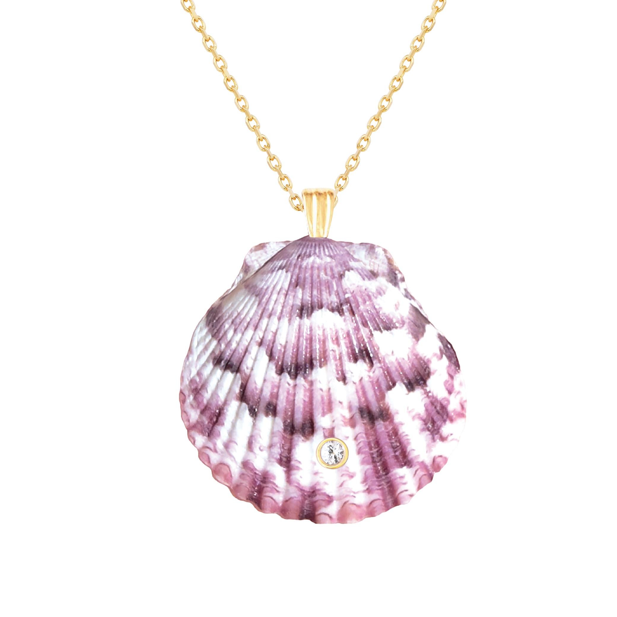 Natural shell pendant with solid 14k gold findings and natural white sapphire gemstone. Wear this pendant alone or layer it with other gold chains for a beautiful layered effect.  

Order includes one shell pendant, exactly as depicted in primary