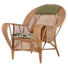 "Canton" - Poltrona in rattan patinato di Kay Fisker