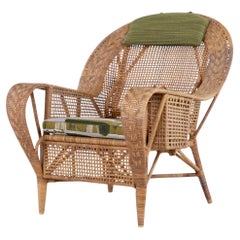 "Canton" - Poltrona in rattan patinato di Kay Fisker