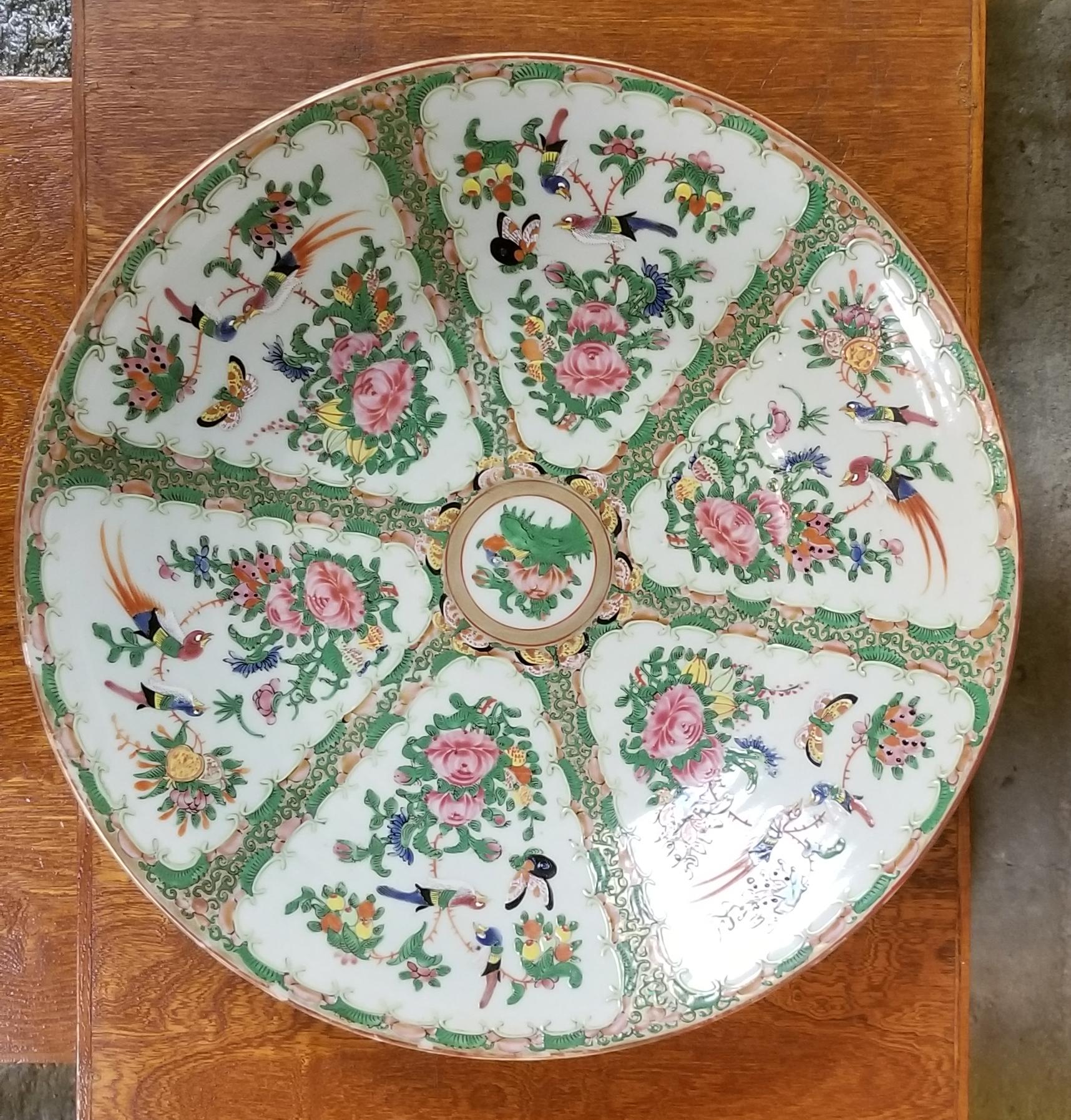 Hand painted and crafted charger. Canton Rose medallion pattern depicting birds, butterflies and flowers, circa late 19th century.