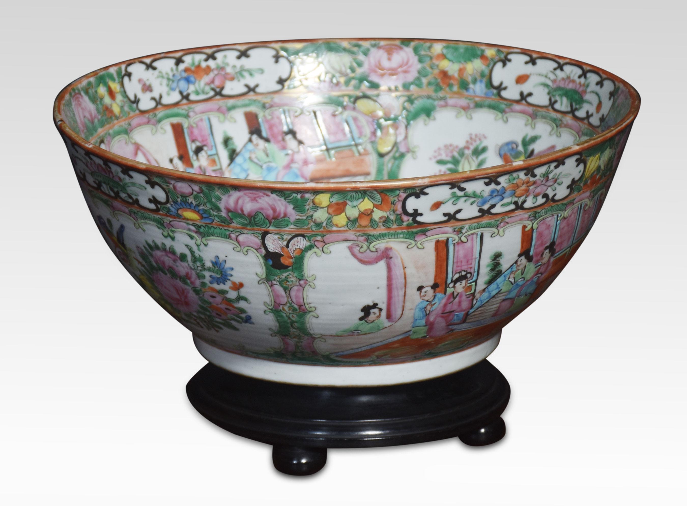 Late 19th-century Cantonese famille rose bowl, typically decorated in famille rose palette with panels of figures, flowers and birds. Raised on turned ebonies stand.
Dimensions
Height 7 Inches
Width 12 Inches
Depth 12 Inches