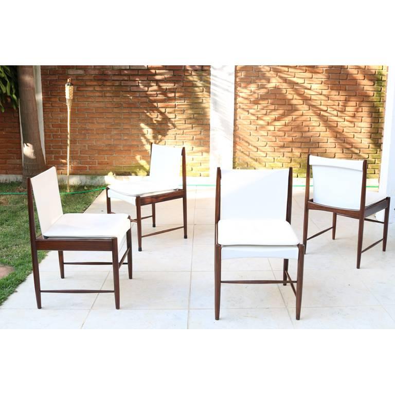 Mid-Century Modern
Set of 6 Cantu low chair by Sergio Rodrigues for OCA, 1958, in solid jacaranda with leather upholstery 

Sergio Rodrigues design work kept closer to modern furniture and certain objects within the Brazilian culture, such as the