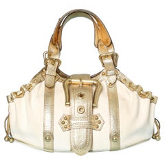 Canvas and gold leather hand-bag with belt and buckle Louis Vuitton  Inventeur at 1stDibs