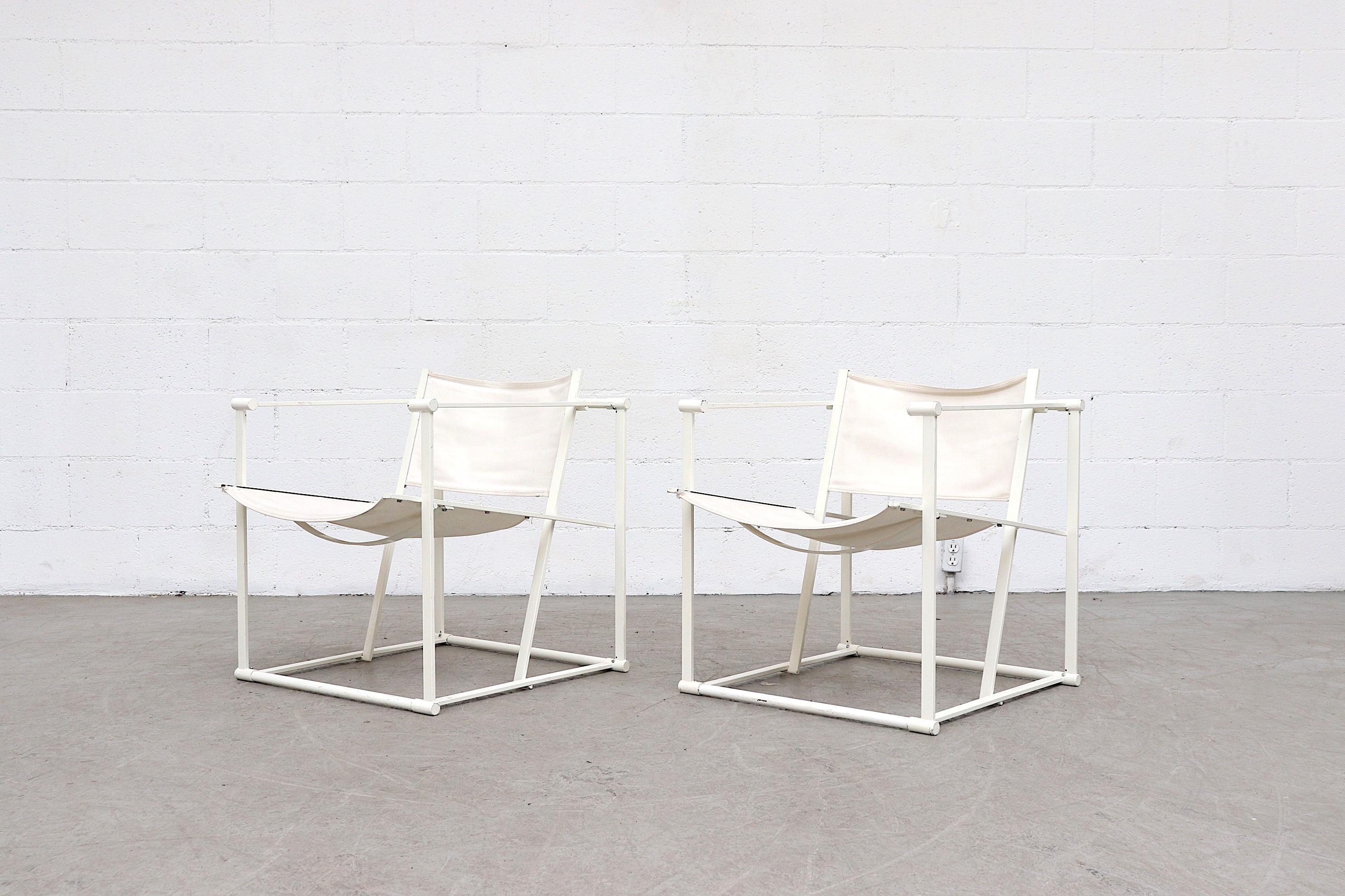 UMS Pastoe FM60, cube lounge chair, designed in 1980 by Radboud van Beekum. White enameled steel frame with original worn white-ish canvas seating. Frame is in original condition with visible wear to the enamel, visible fraying at seat and back
