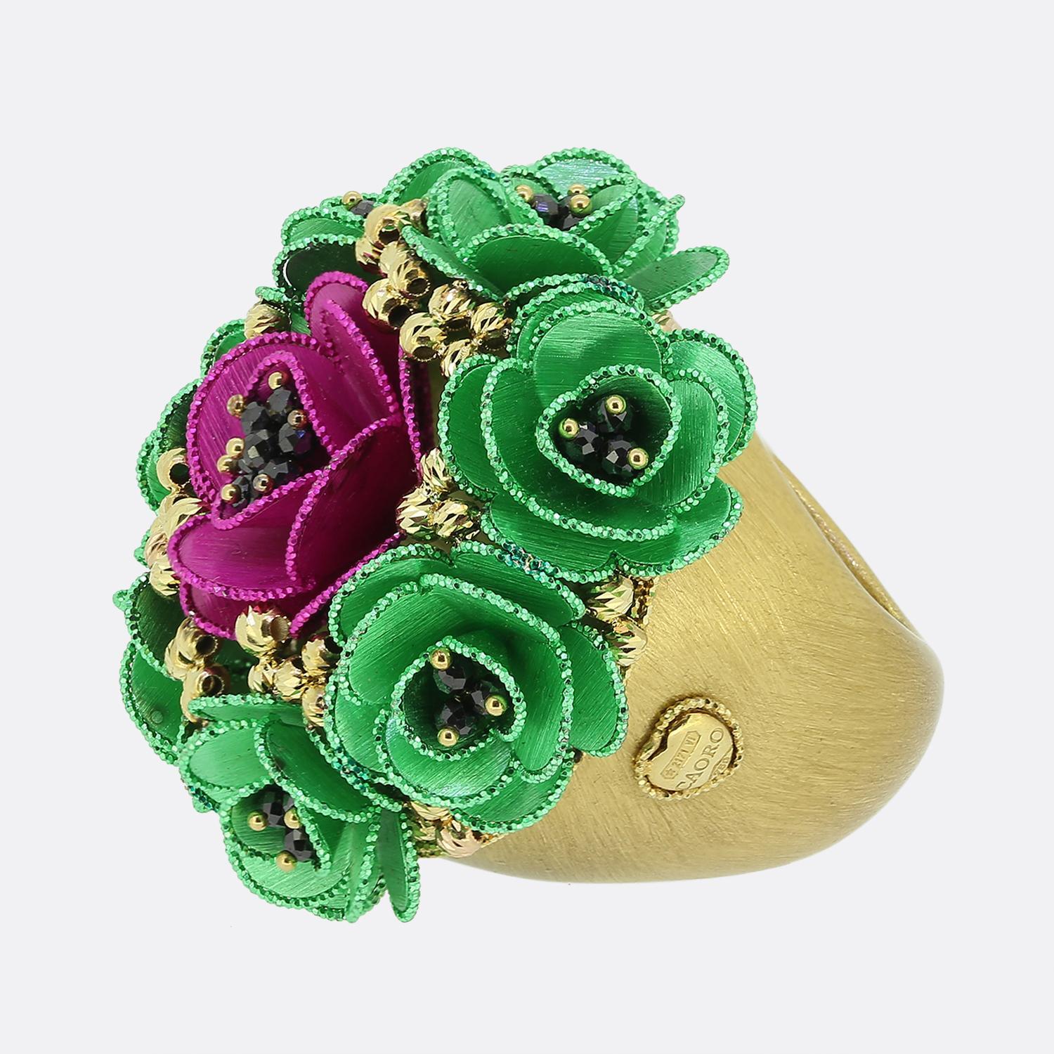 Here we have a fabulous oversized cocktail ring from the renowned unique Italian jewellery designer, Caoro. This piece has been crafted from 18ct yellow gold and forms part of their Bouquet collection. An electroformed gold band plays host to a wide
