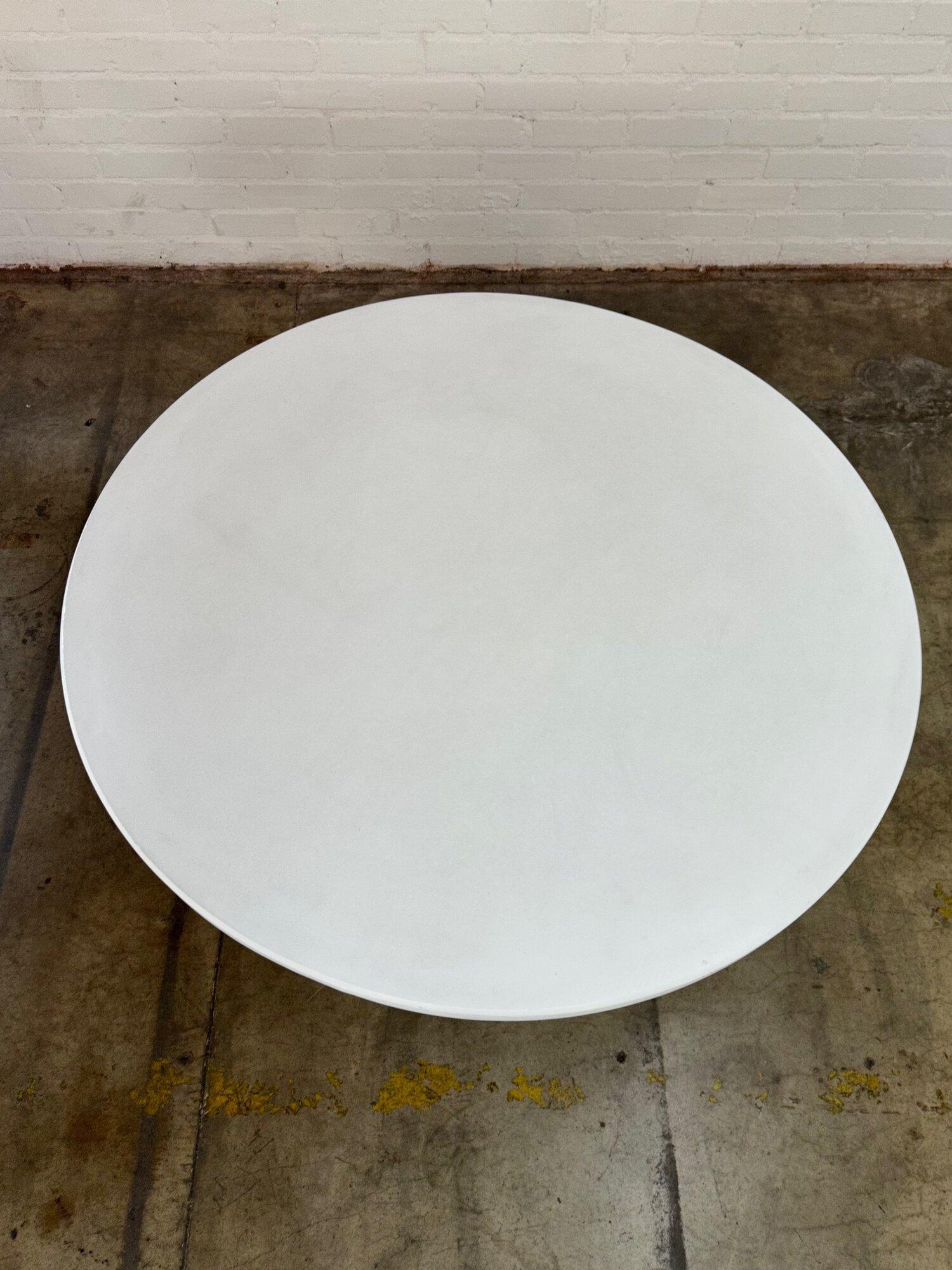 W55.5 D55.5 H30 KC27.5

Vintage stone surface in white on a handcrafted ribbed pedestal table. Stone surface was a new left over surface from an in house project. Stone is crafted to look and feel organic. Stone is slightly textured throughout as