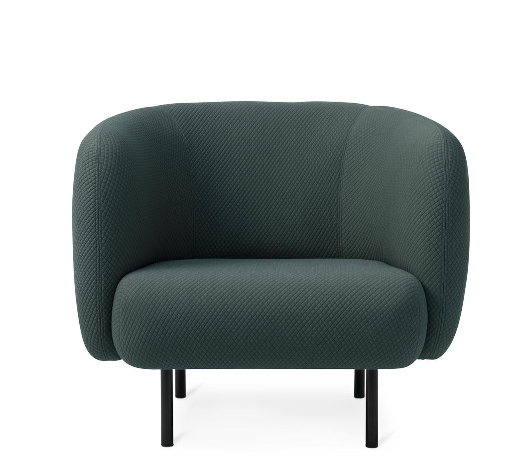 Cape lounge chair Mosaic petrol shade by Warm Nordic
Dimensions: D 90 x W 82 x H 80 cm
Material: Textile upholstery, Wooden frame, Powder coated black steel legs
Weight: 34.5 kg
Also available in different colours and finishes.

An elegant