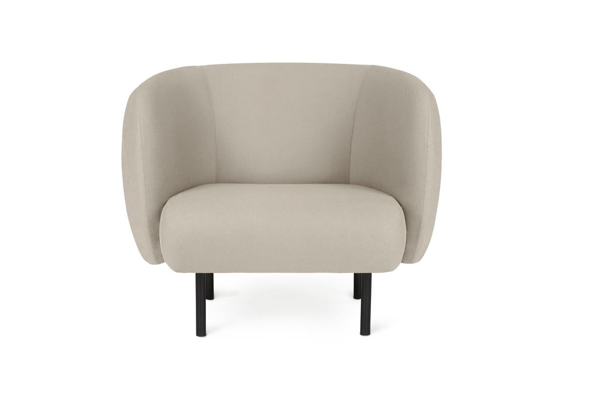 Cape Lounge chair pearl grey by Warm Nordic
Dimensions: D90 x W82 x H 80 cm
Material: Textile upholstery, Wooden frame, Powder coated black steel legs
Weight: 34.5 kg
Also available in different colors and finishes. 

An elegant armchair with