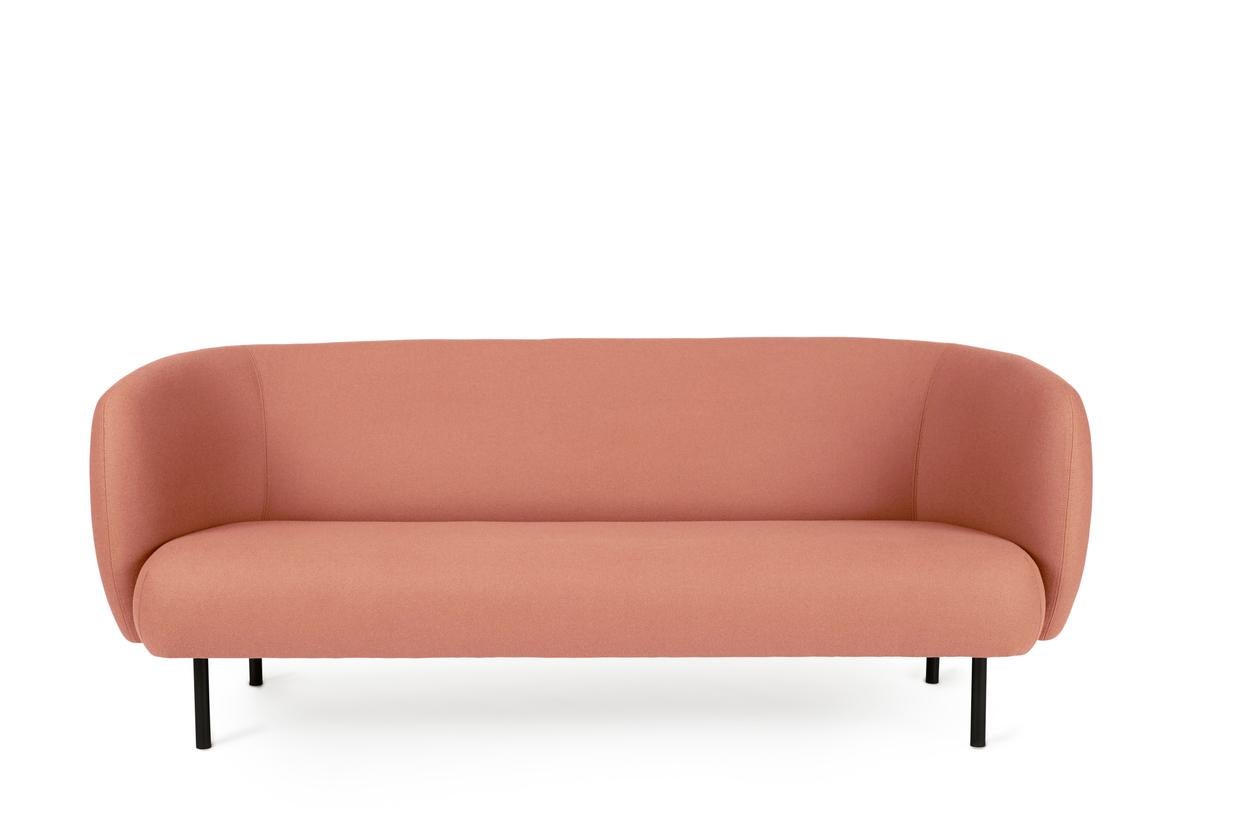 Caper 3 seater blush by Warm Nordic
Dimensions: D 206 x W 84 x H 63 cm
Material: Textile upholstery, Wooden frame, Powder coated black steel legs.
Weight: 55.5 kg
Also available in different colours.

An elegant sofa with an organic design