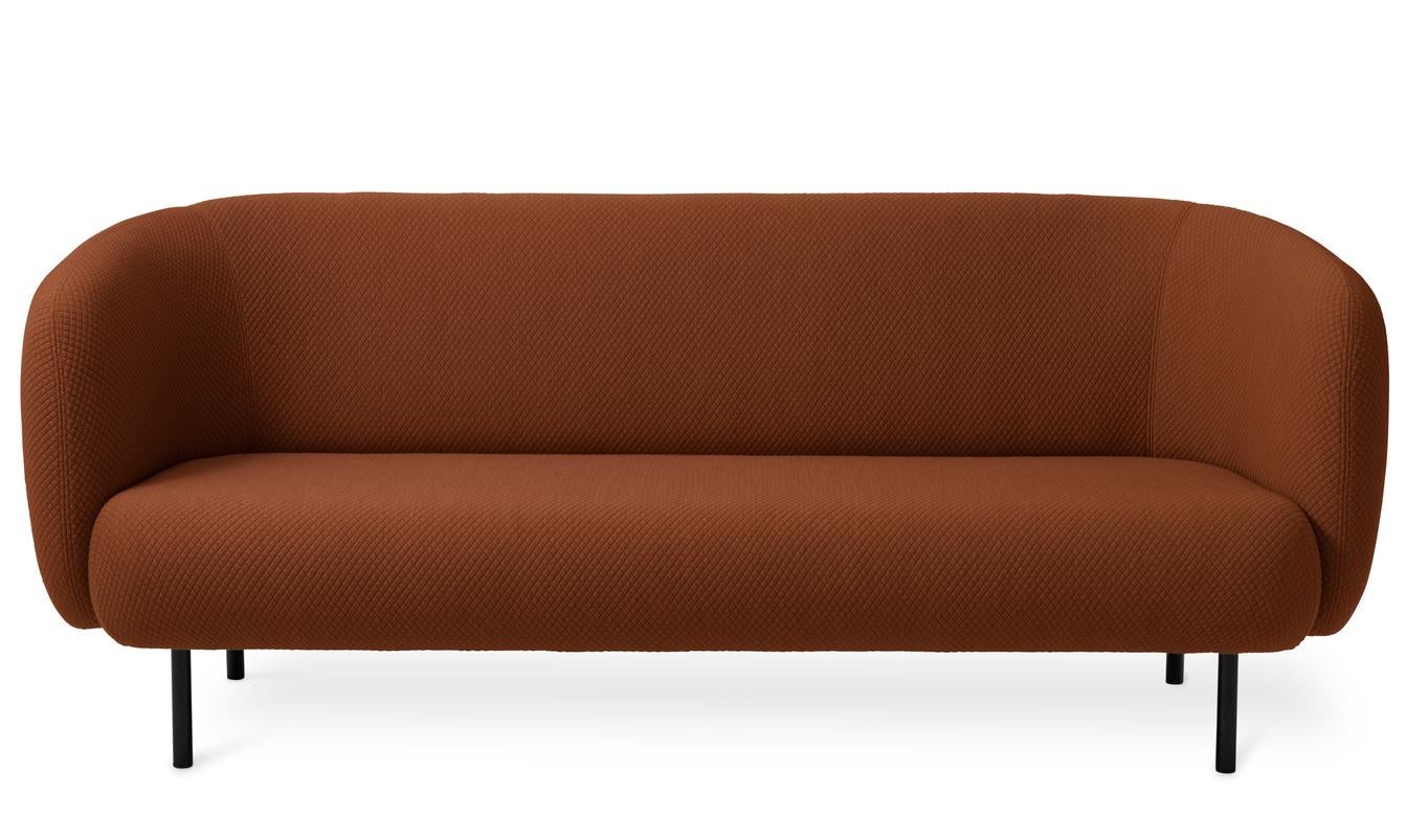Caper 3 seater Mosaic spicy brown by Warm Nordic
Dimensions: D 206 x W 84 x H 63 cm
Material: Textile upholstery, Wooden frame, Powder coated black steel legs.
Weight: 55.5 kg
Also available in different colours and finishes.

An elegant sofa