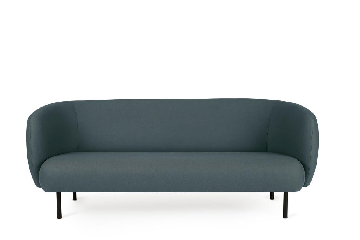 Caper 3 seater olive by Warm Nordic
Dimensions: D 206 x W 84 x H 63 cm
Material: Textile upholstery, Wooden frame, Powder coated black steel legs.
Weight: 55.5 kg
Also available in different colours.

An elegant sofa with an organic design
