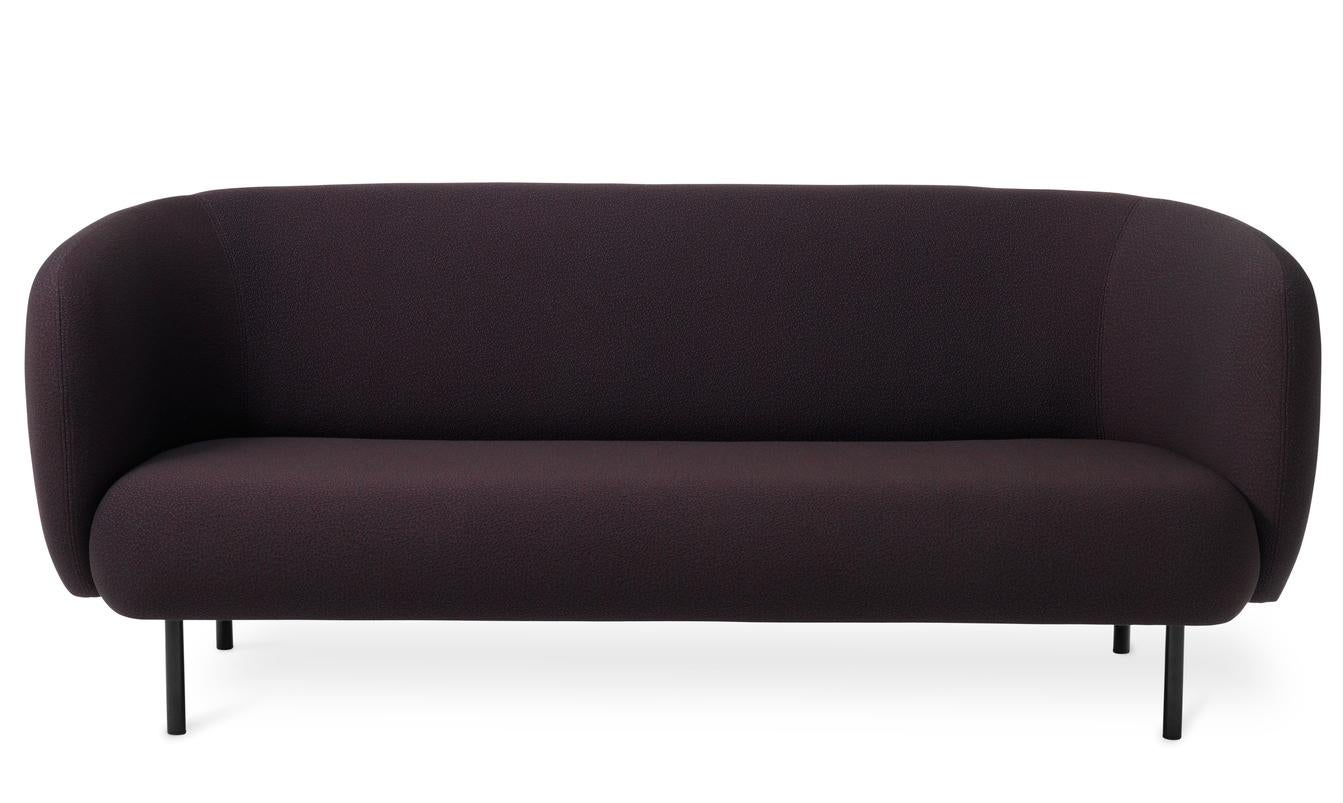Caper 3 seater Sprinkles Eggplant by Warm Nordic
Dimensions: D 206 x W 84 x H 63 cm
Material: Textile upholstery, Wooden frame, Powder coated black steel legs.
Weight: 55.5 kg
Also available in different colours and finishes.

An elegant sofa