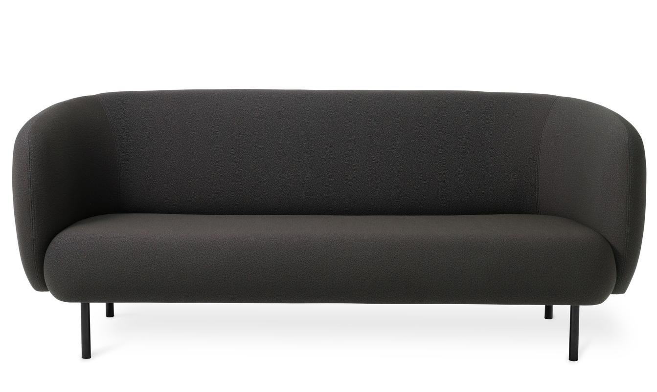 Caper 3 seater sprinkles mocca by Warm Nordic
Dimensions: D206 x W84 x H 63 cm
Material: Textile upholstery, Wooden frame, Powder coated black steel legs.
Weight: 55.5 kg
Also available in different colors and finishes. 

An elegant sofa with