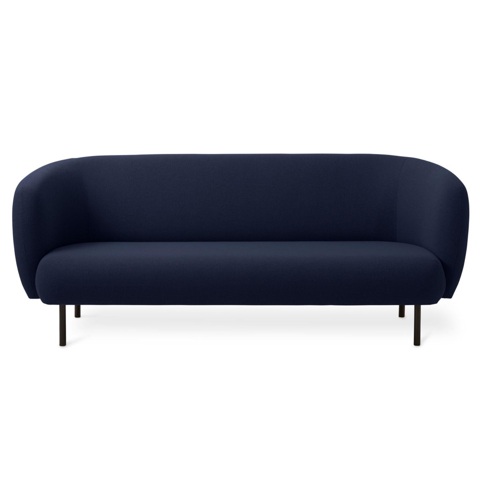 Caper 3 seater steel blue by Warm Nordic
Dimensions: D206 x W84 x H 63 cm
Material: textile upholstery, wooden frame, powder coated black steel legs.
Weight: 55.5 kg
Also available in different colours and finishes. 

An elegant sofa with an