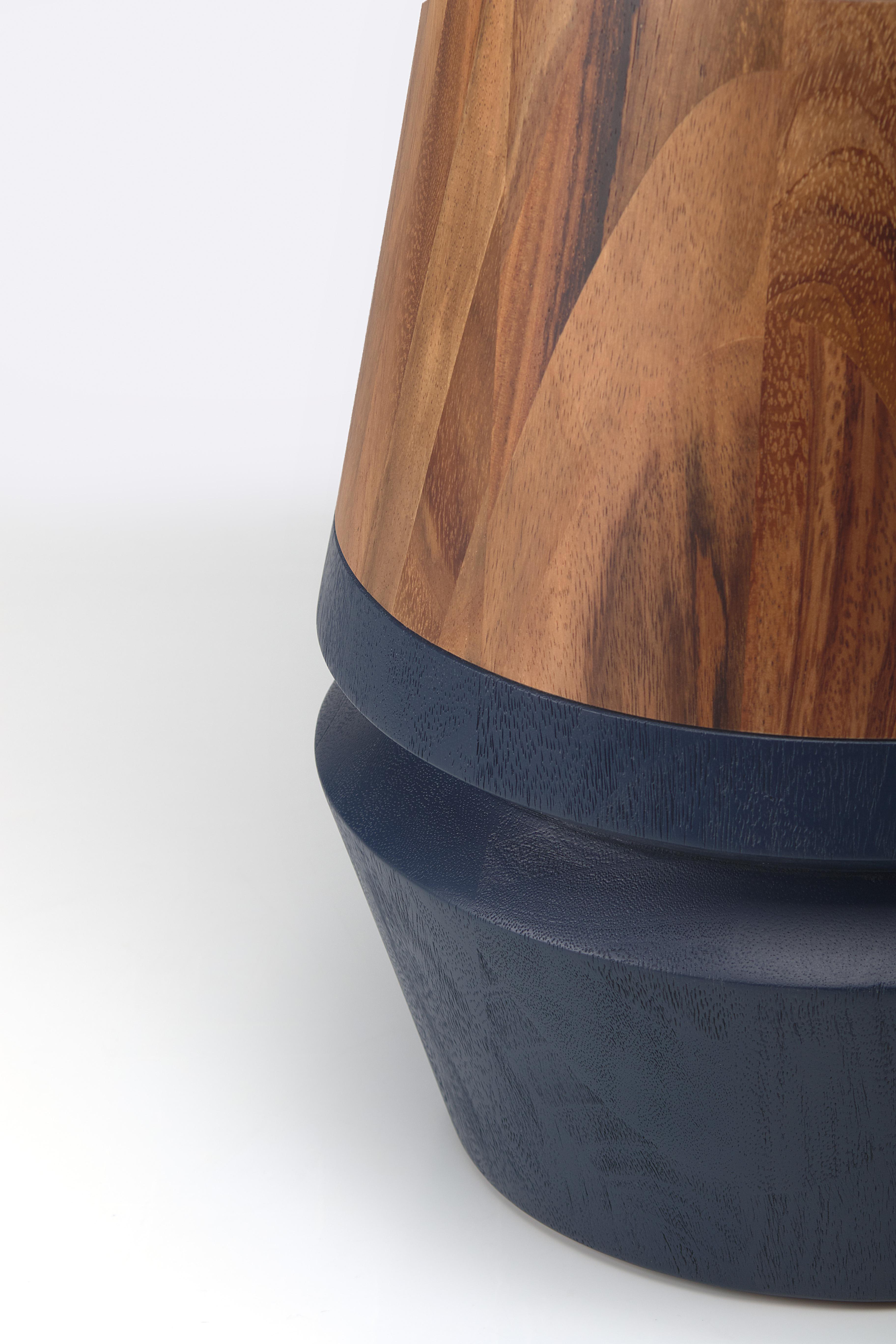 Bask in the beauty of a fusion between tradition and contemporary design with our Capirucho Turned Side Table in Navy and Conacaste. Reflecting the joyous spirit of a beloved Guatemalan toy, this playful side table is a modern interpretation that