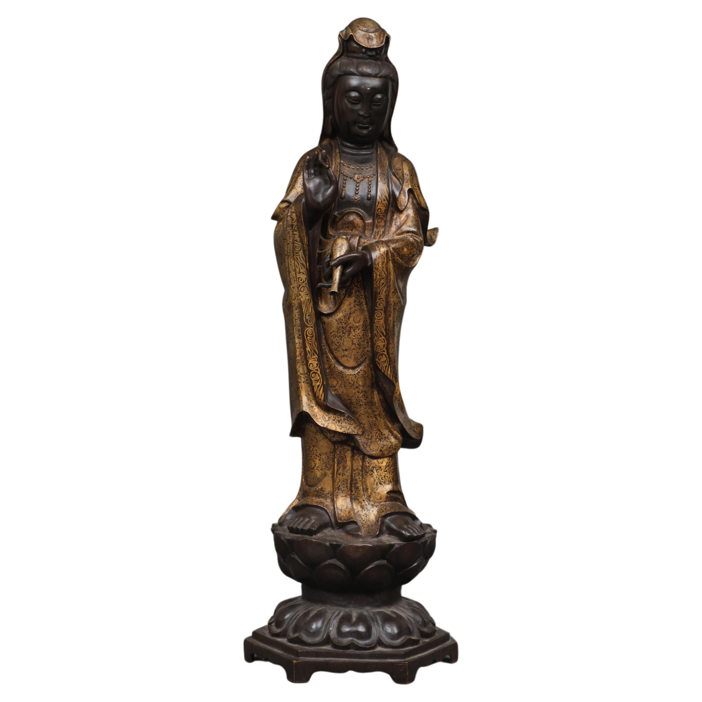 Capital Chinese bronze figure of a standing bodhisattva Guanyin For Sale