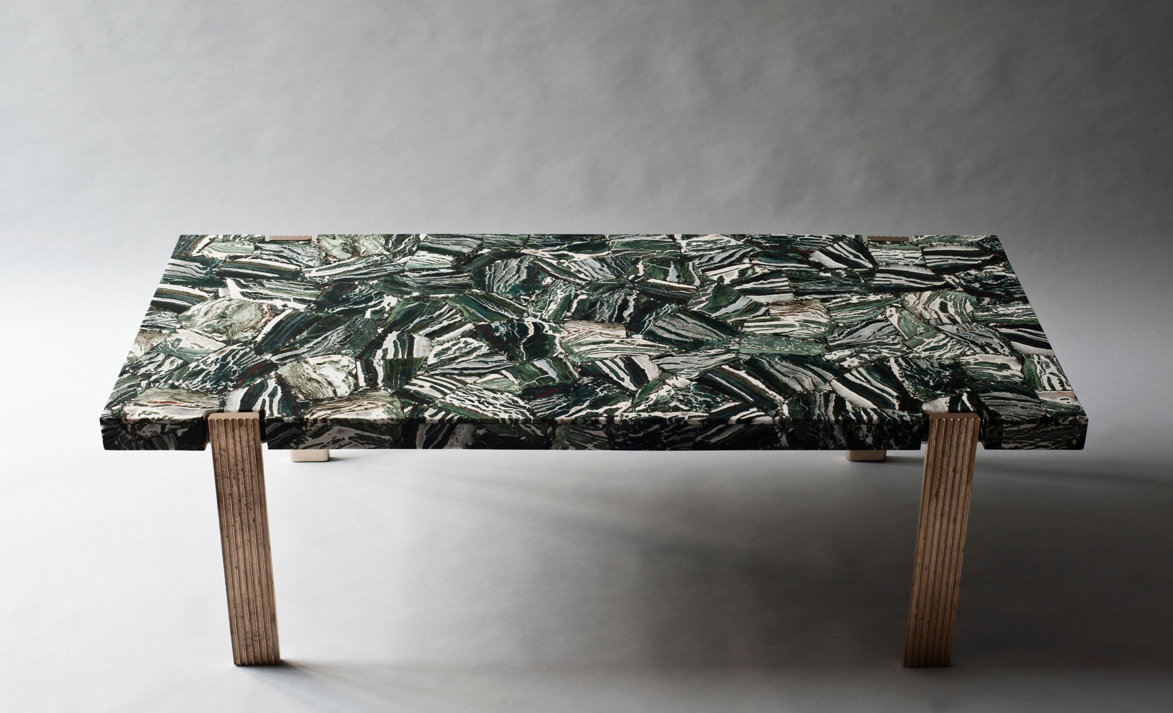 Capital coffee table by DeMuro Das.
Dimensions: W 135 x D 60 x H 43 cm.
Materials: Agate (Green Zebra ) - polished (random) tabletop
 Solid bronze (Antique) legs

 Dimensions and finishes can be customized.

DeMuro Das is an international