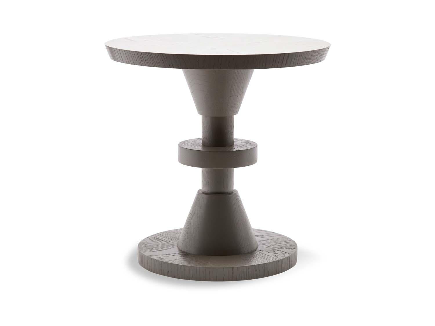 The capitola table features a series of geometric shapes stacked on top of each other with solid wood details. Available in American walnut or white oak. Shown here in Chelsea Grey Pigmented Oak

The Lawson-Fenning Collection is designed and
