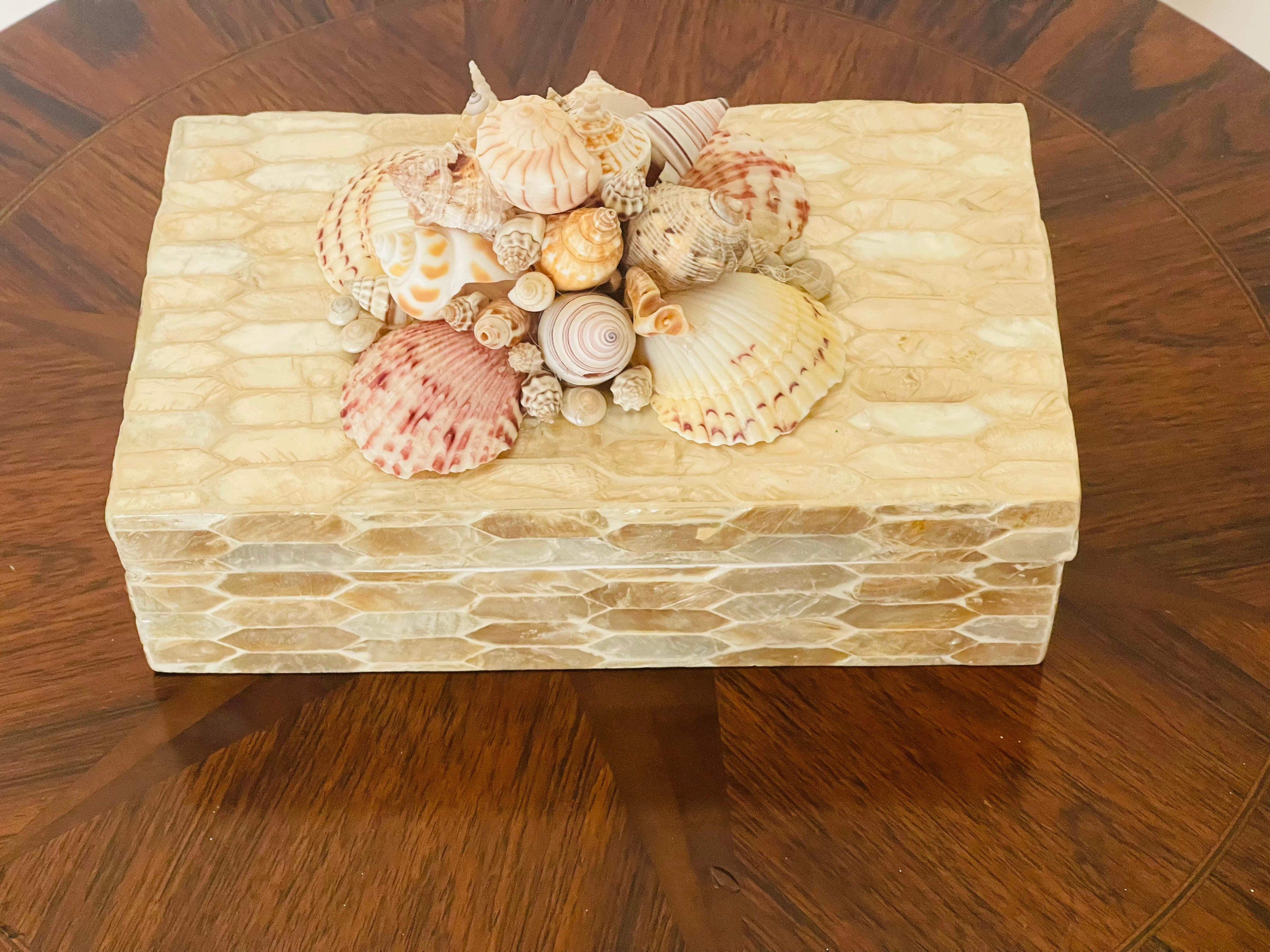 Mid 20 th c Capiz shells encrusted jewelry box decorated with Florida sea shells.