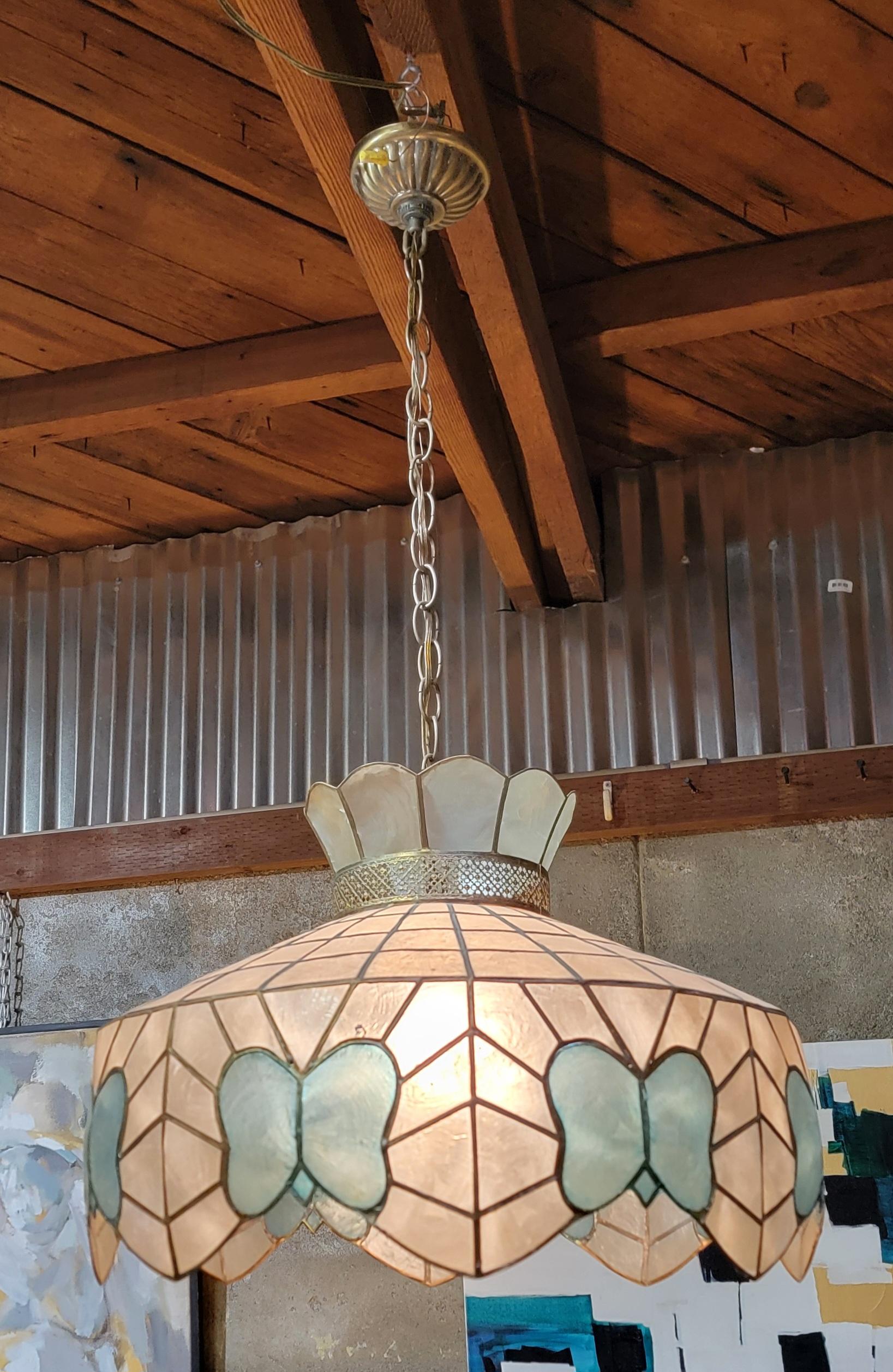 Capiz shell chandelier / pendant light with  blue stylized butterflies. Shade measures 16.5: diameter 13