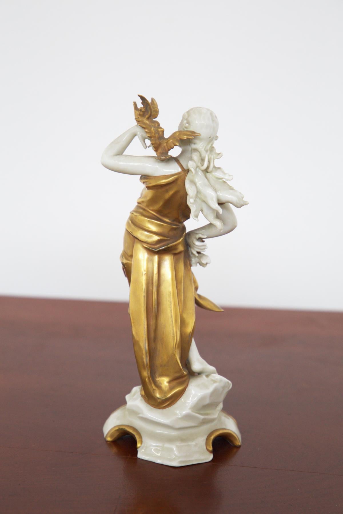 A ceramic figurine, part of the 'Signs of the Zodiac' collection, made in the early 20th century from Capodimonte ceramic painted in gold.
Capodimonte is a type of Italian porcelain first developed in the 18th century. It is known for its bright