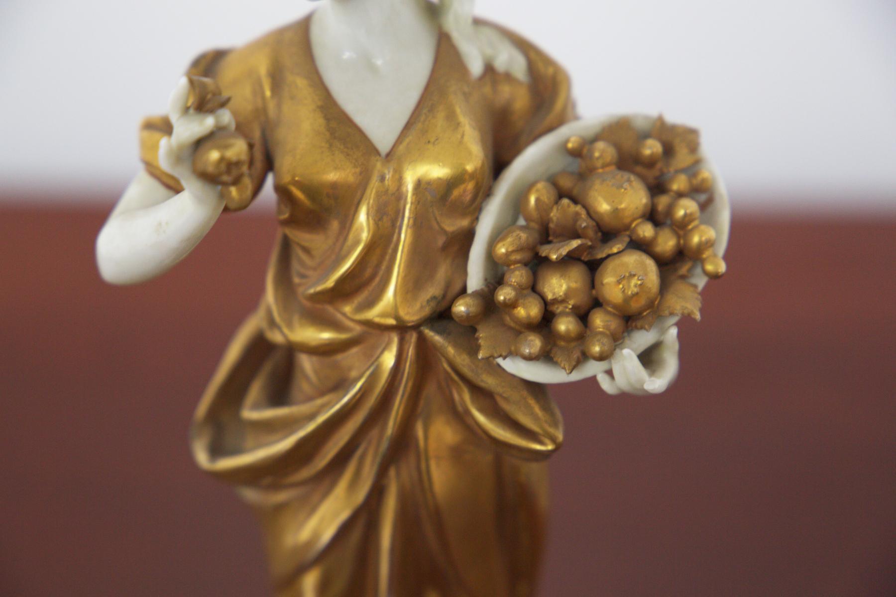 Gorgeous ceramic figurine, part of the 'Signs of the Zodiac' collection, made in the early 20th century from Capodimonte ceramic painted in gold.
Capodimonte is a type of Italian porcelain first developed in the 18th century. It is known for its