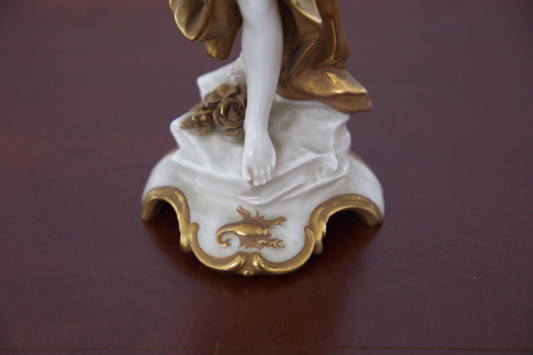 Stunning ceramic statuine, part of the 'Signs of the Zodiac' collection, made in the early 20th century from Capodimonte ceramic painted in gold.
Capodimonte is a type of Italian porcelain first developed in the 18th century. It is known for its